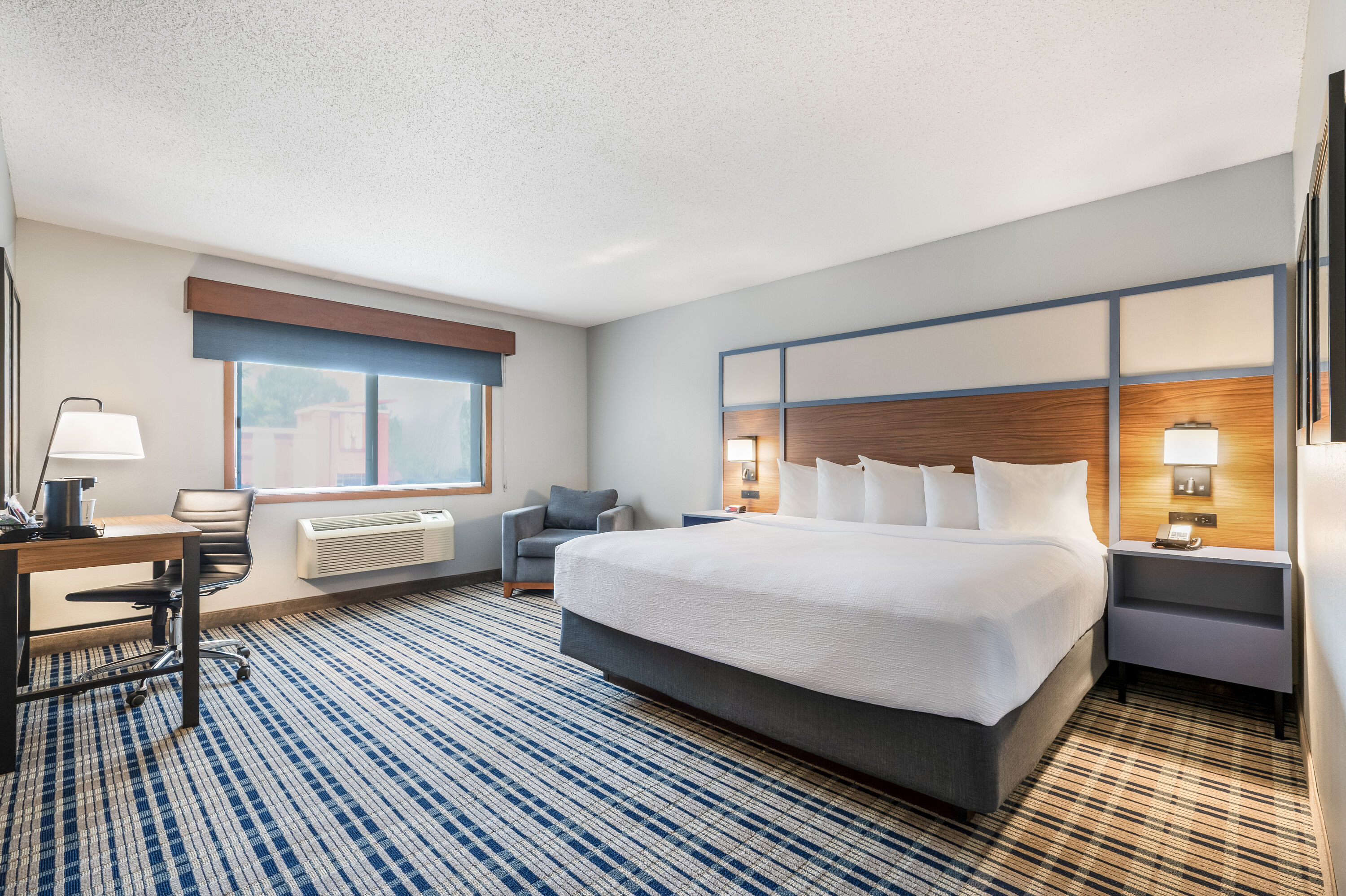 King bed guest room at the AmericInn by Wyndham Bemidji in Bemidji, Minnesota