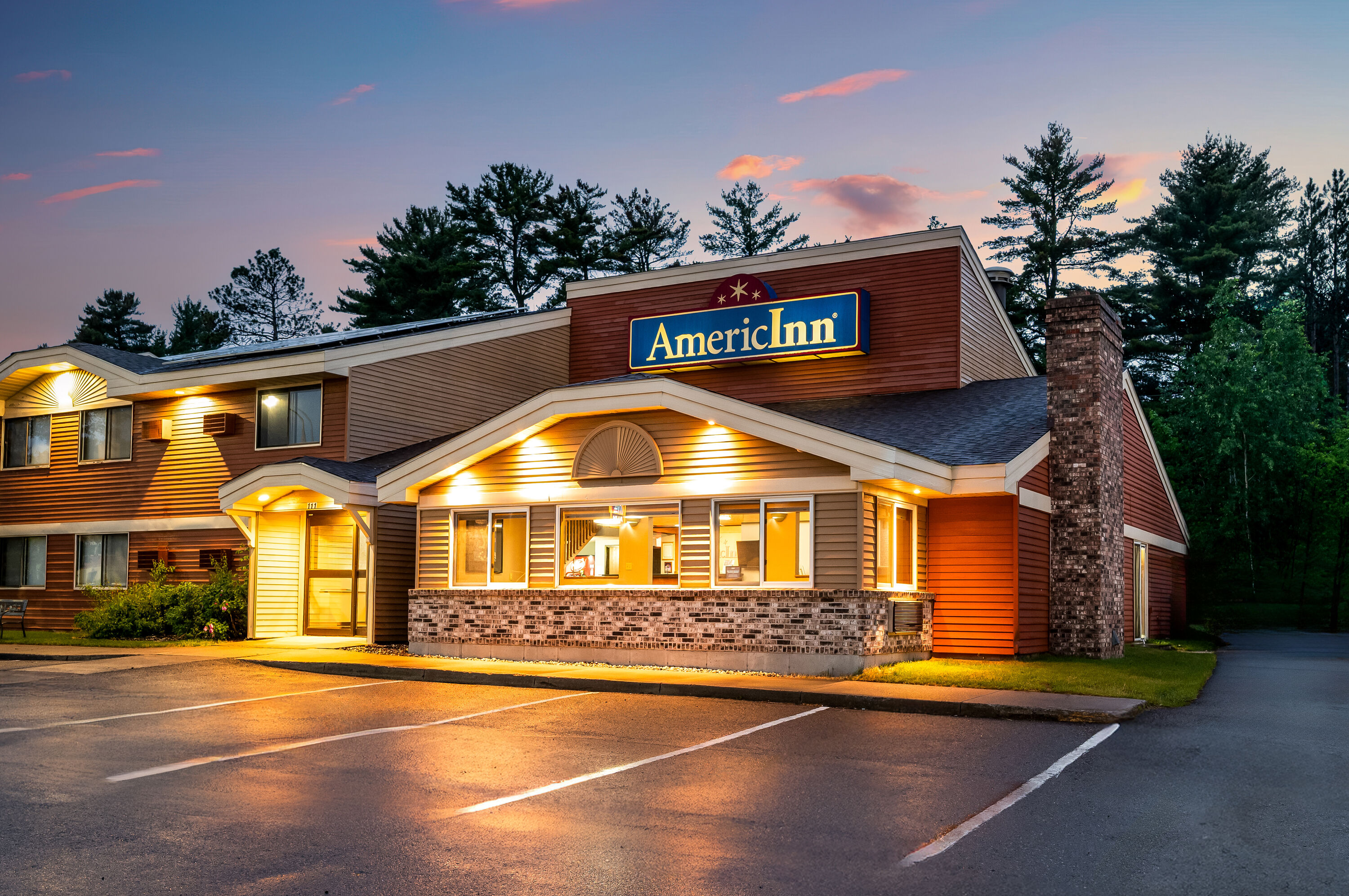 Exterior Dusk Image of AmericInn by Wyndham Cloquet hotel in Cloquet, Minnesota