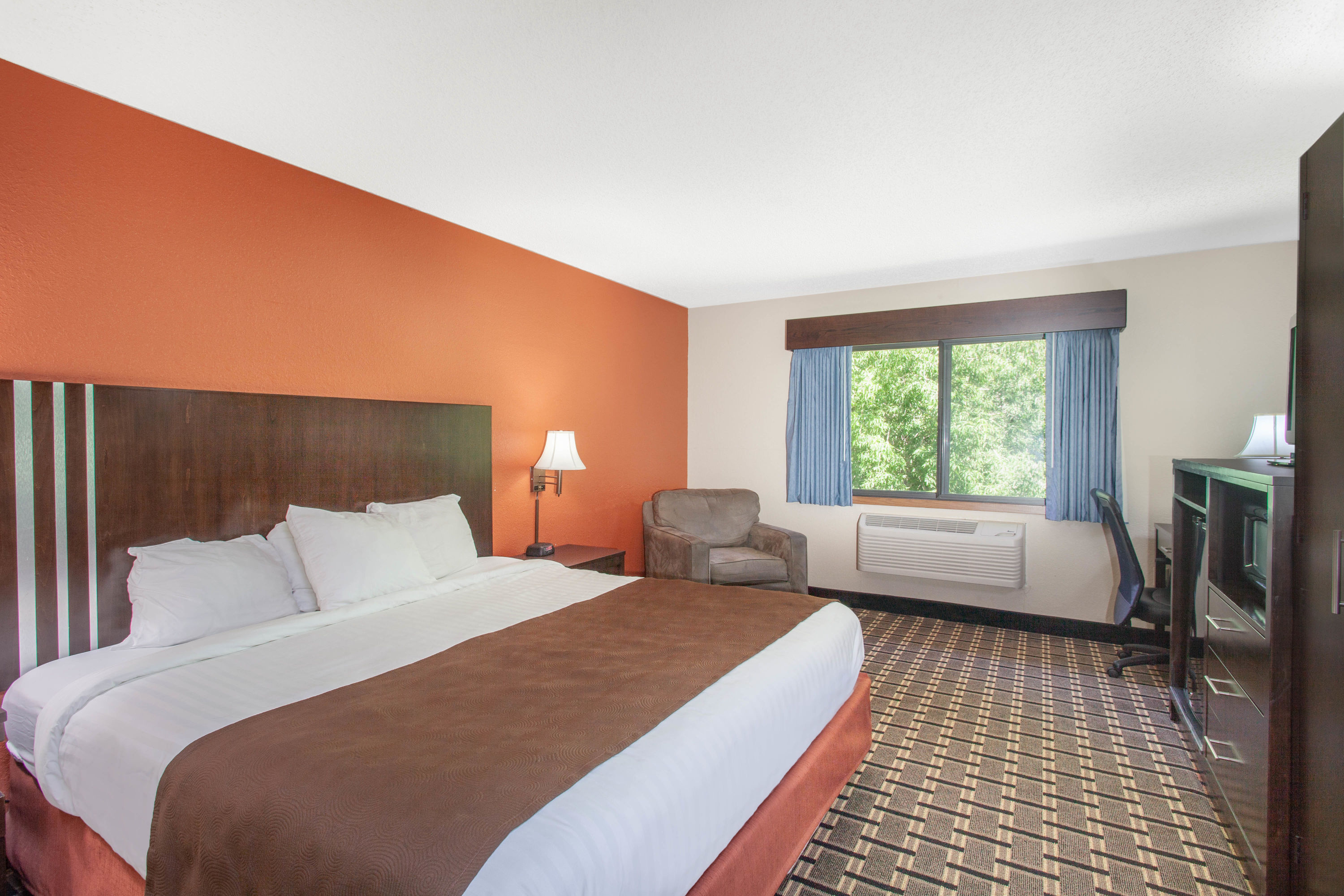 Guest room at the AmericInn by Wyndham Cloquet in Cloquet, Minnesota