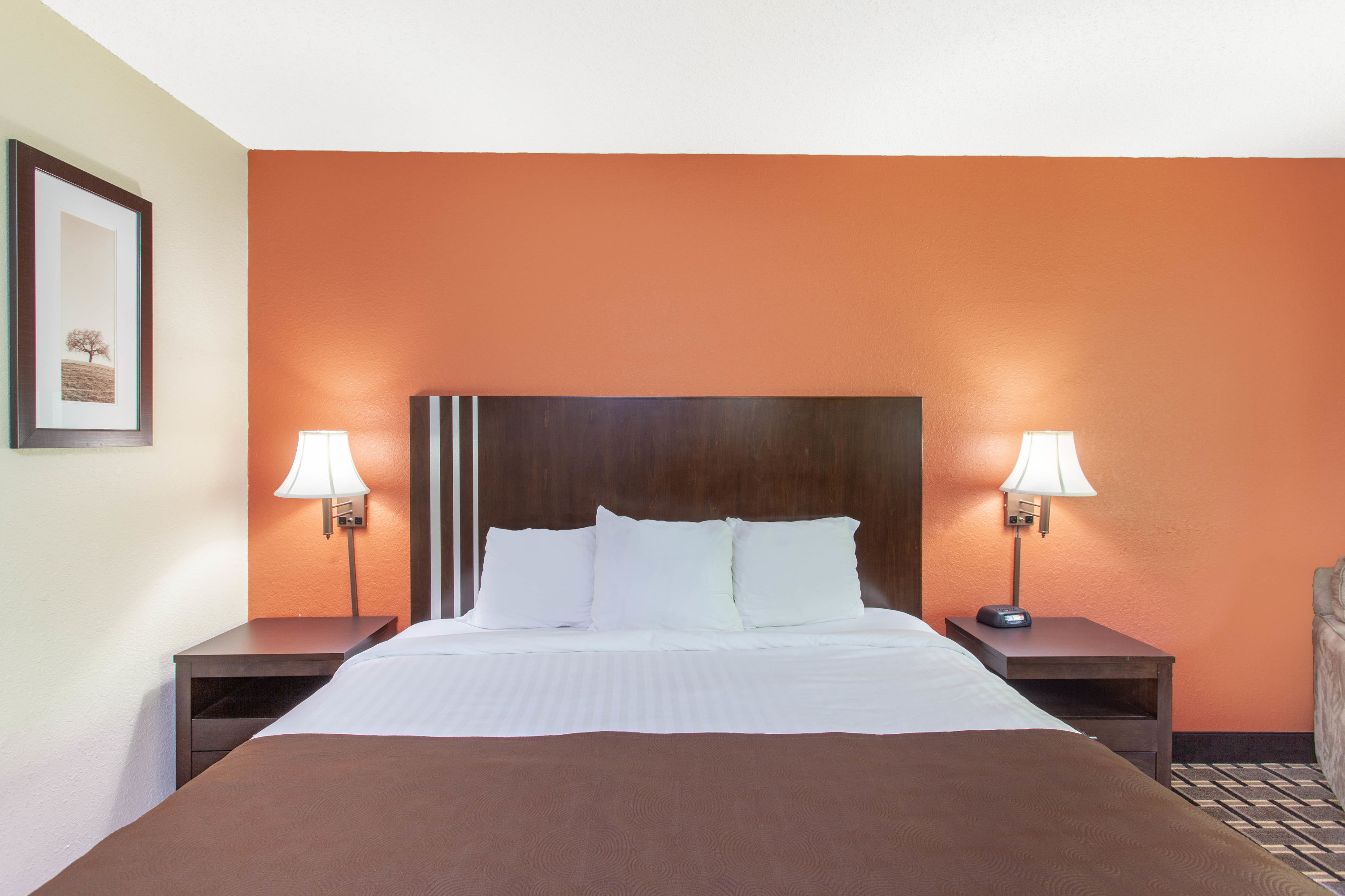 Guest room at the AmericInn by Wyndham Cloquet in Cloquet, Minnesota