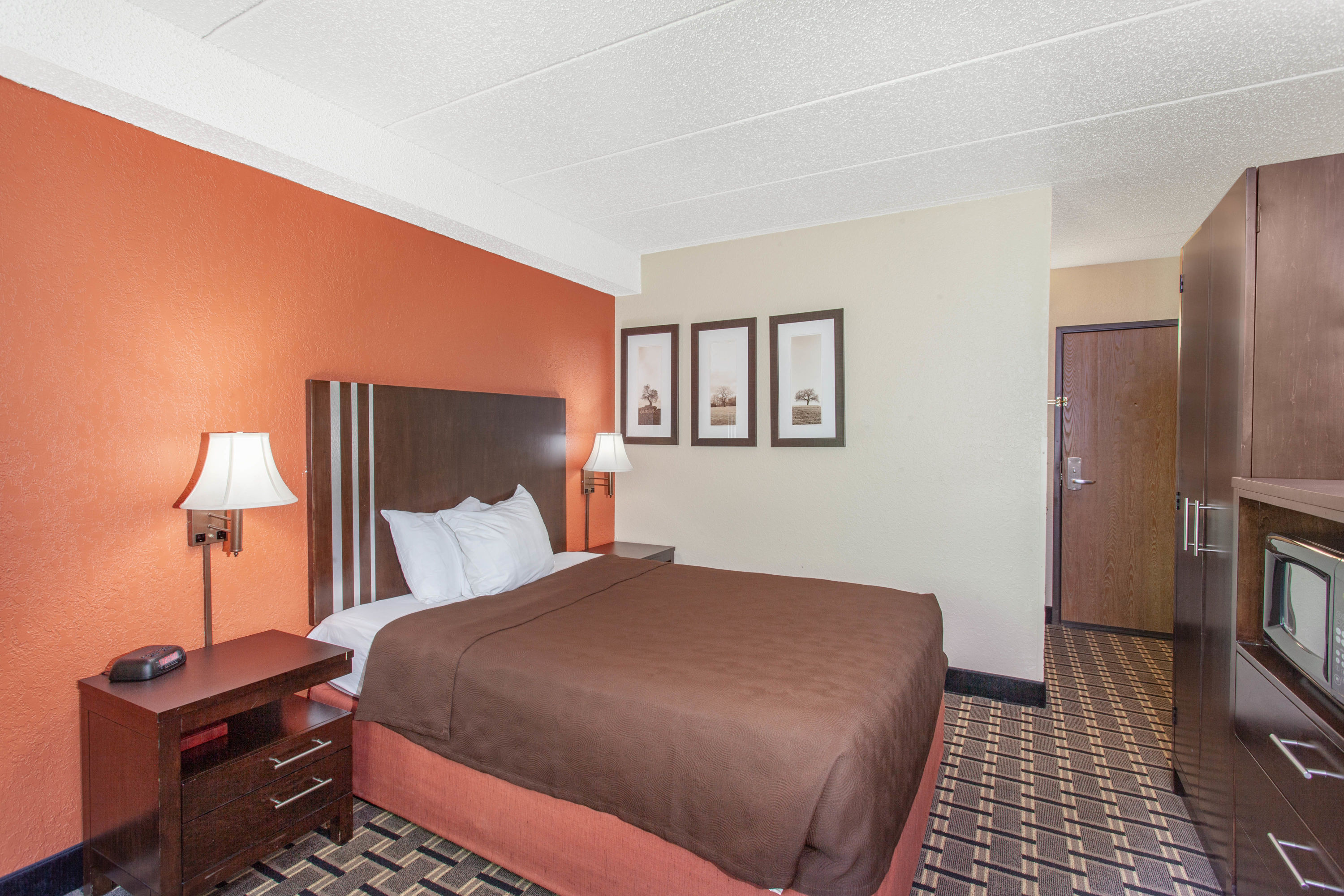 Guest room at the AmericInn by Wyndham Cloquet in Cloquet, Minnesota