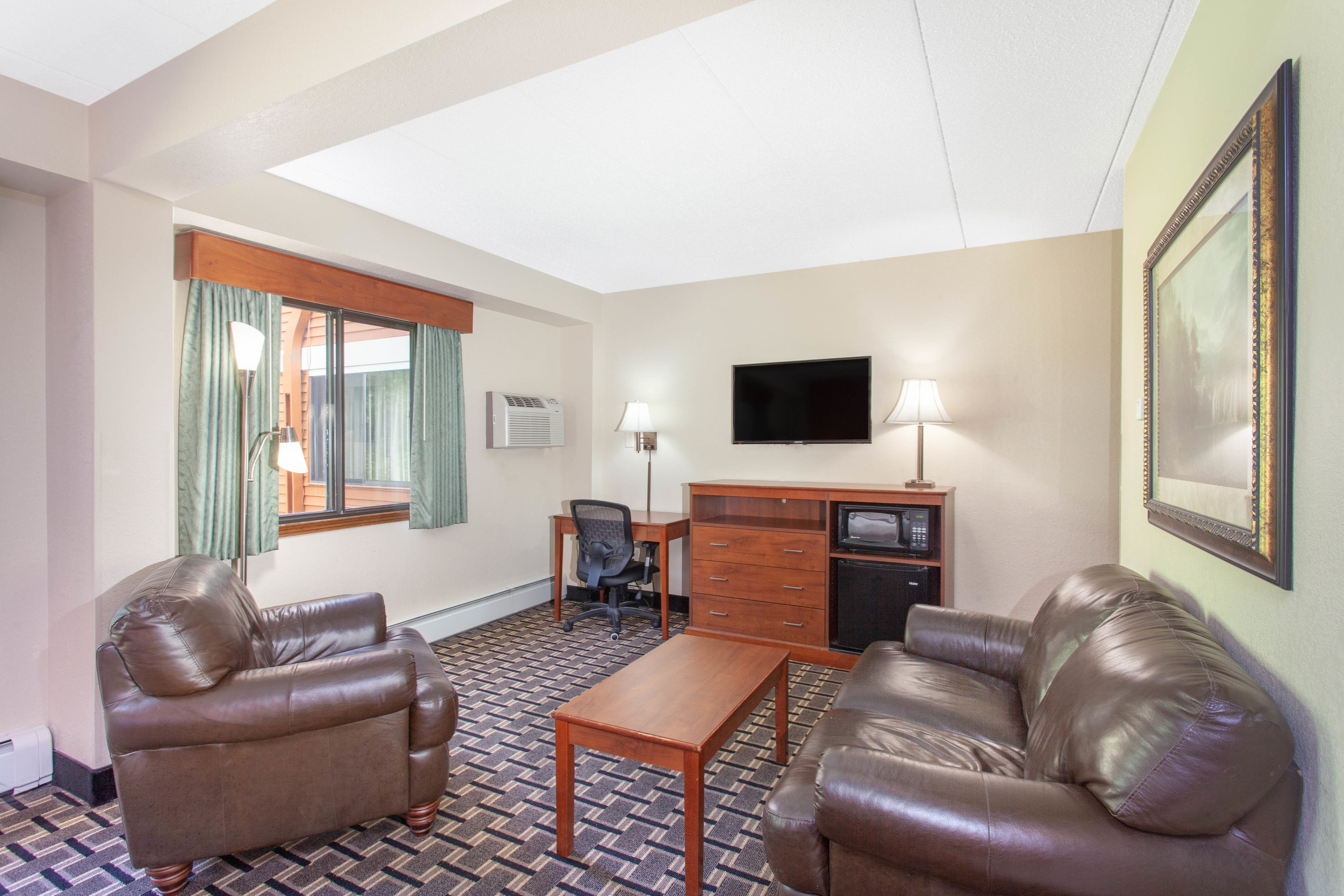 AmericInn by Wyndham Cloquet suite living room in Cloquet, Minnesota