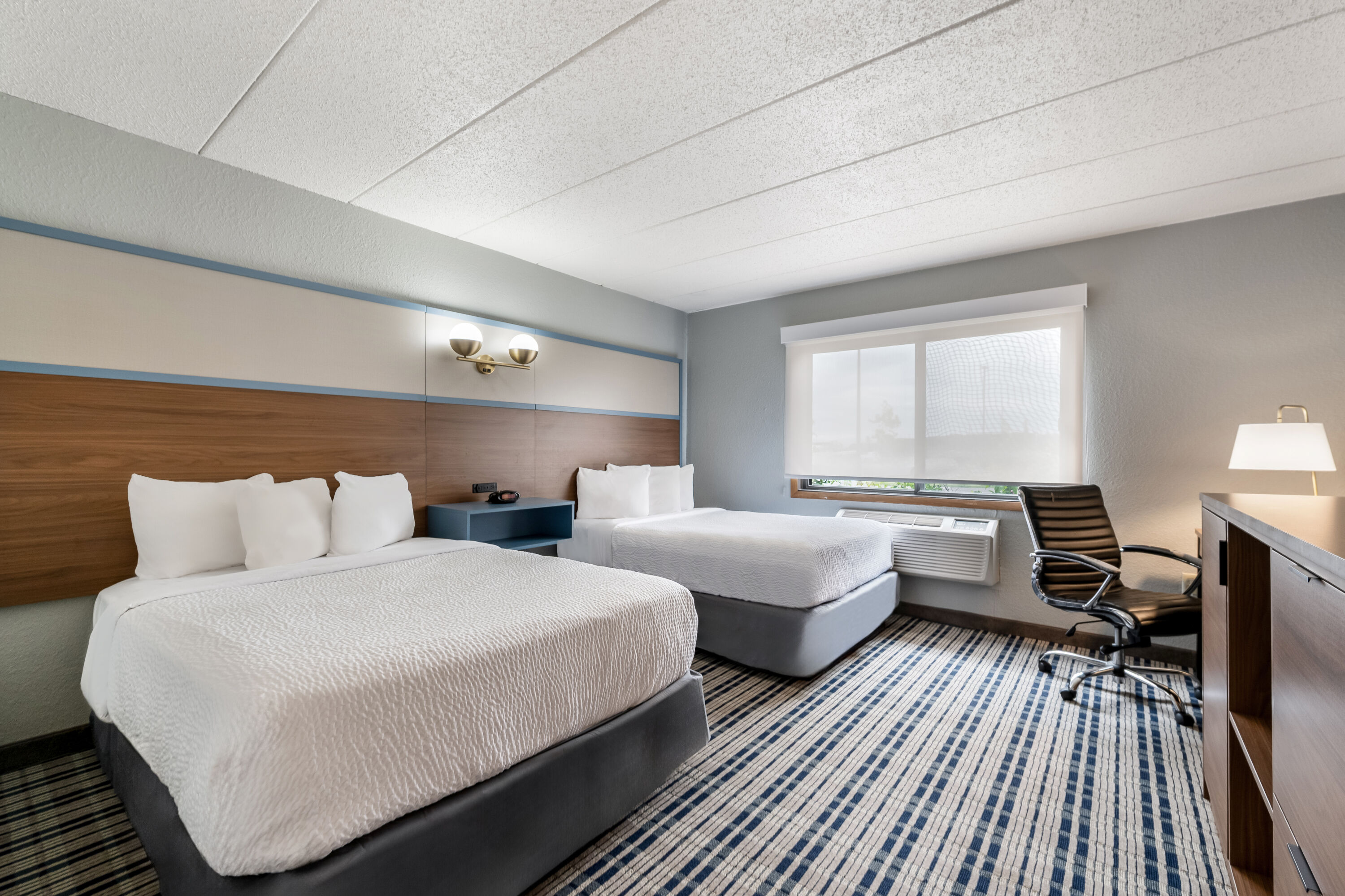 Double bed guest room at the AmericInn by Wyndham Cloquet in Cloquet, Minnesota