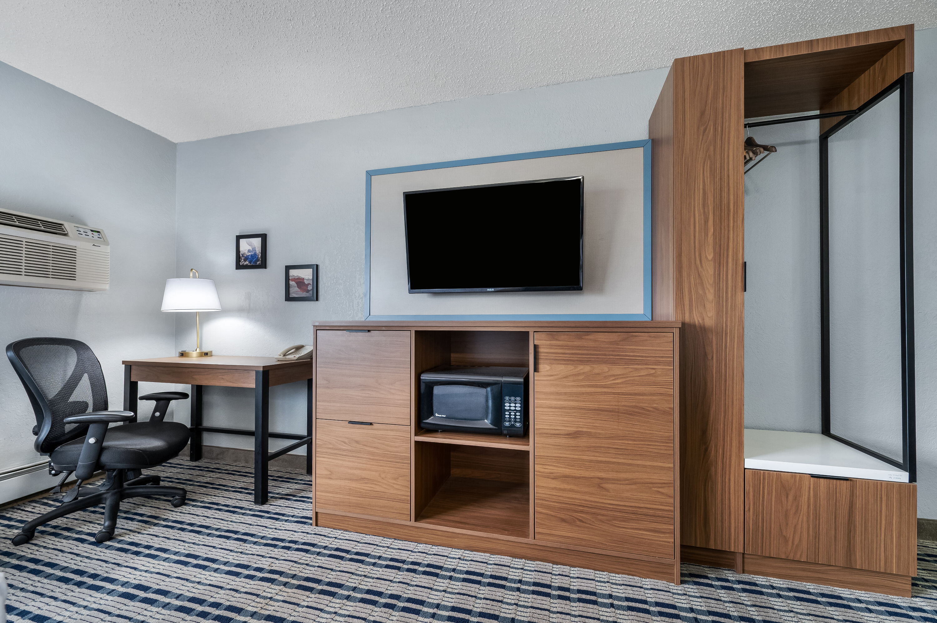 King bed guest room at the AmericInn by Wyndham Cloquet in Cloquet, Minnesota