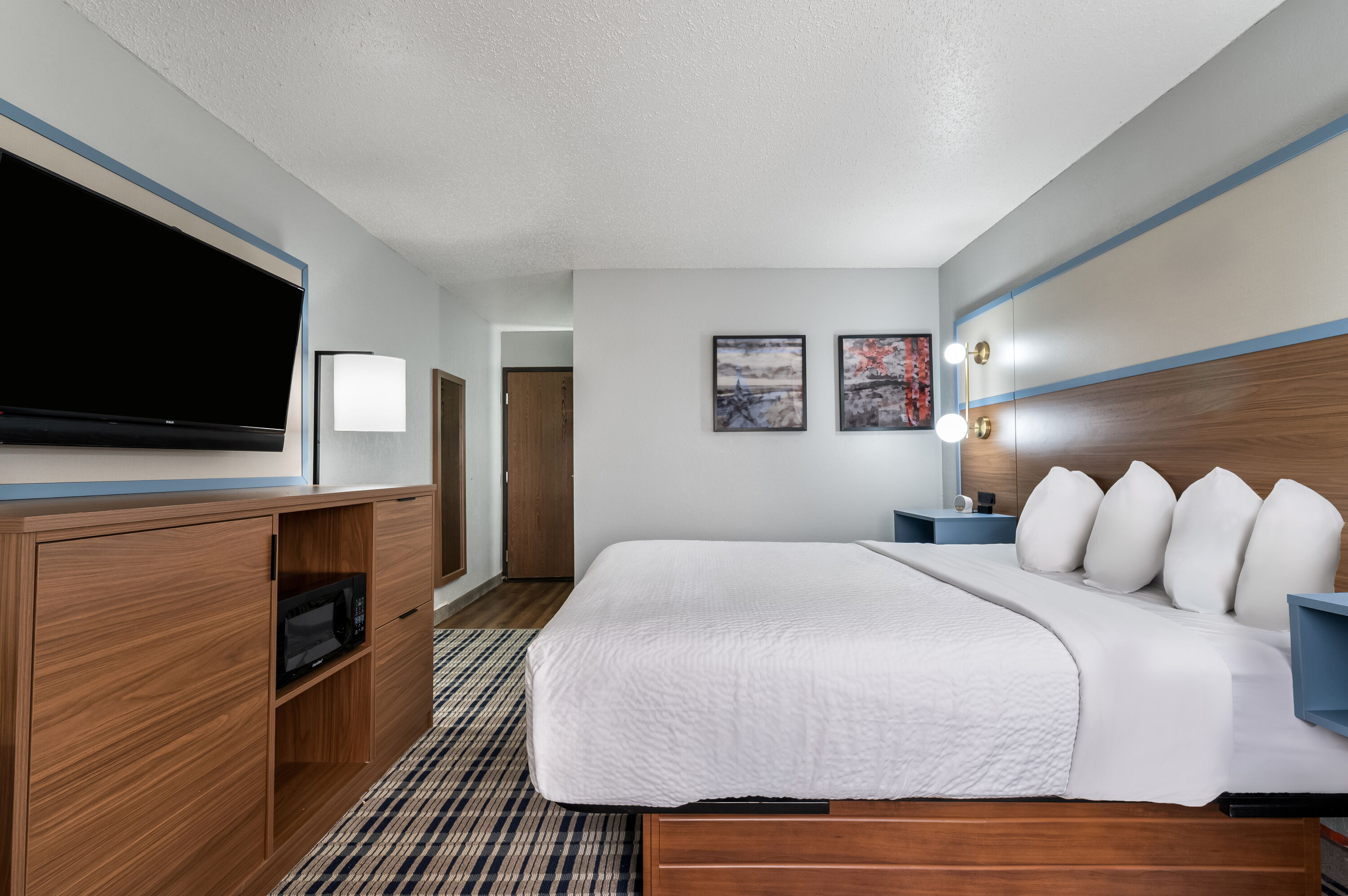 King bed guest room at the AmericInn by Wyndham Cloquet in Cloquet, Minnesota