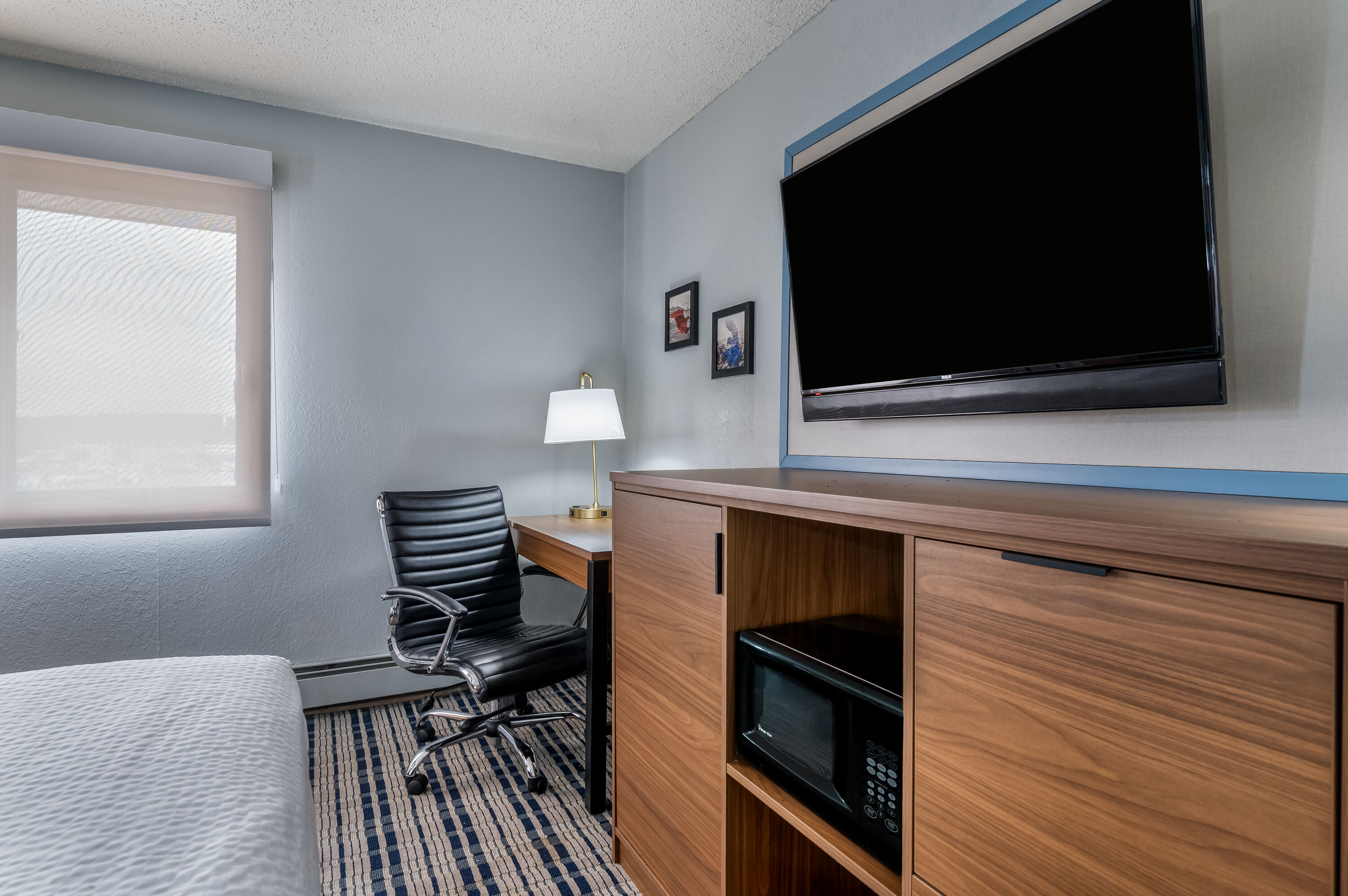 King bed guest room at the AmericInn by Wyndham Cloquet in Cloquet, Minnesota