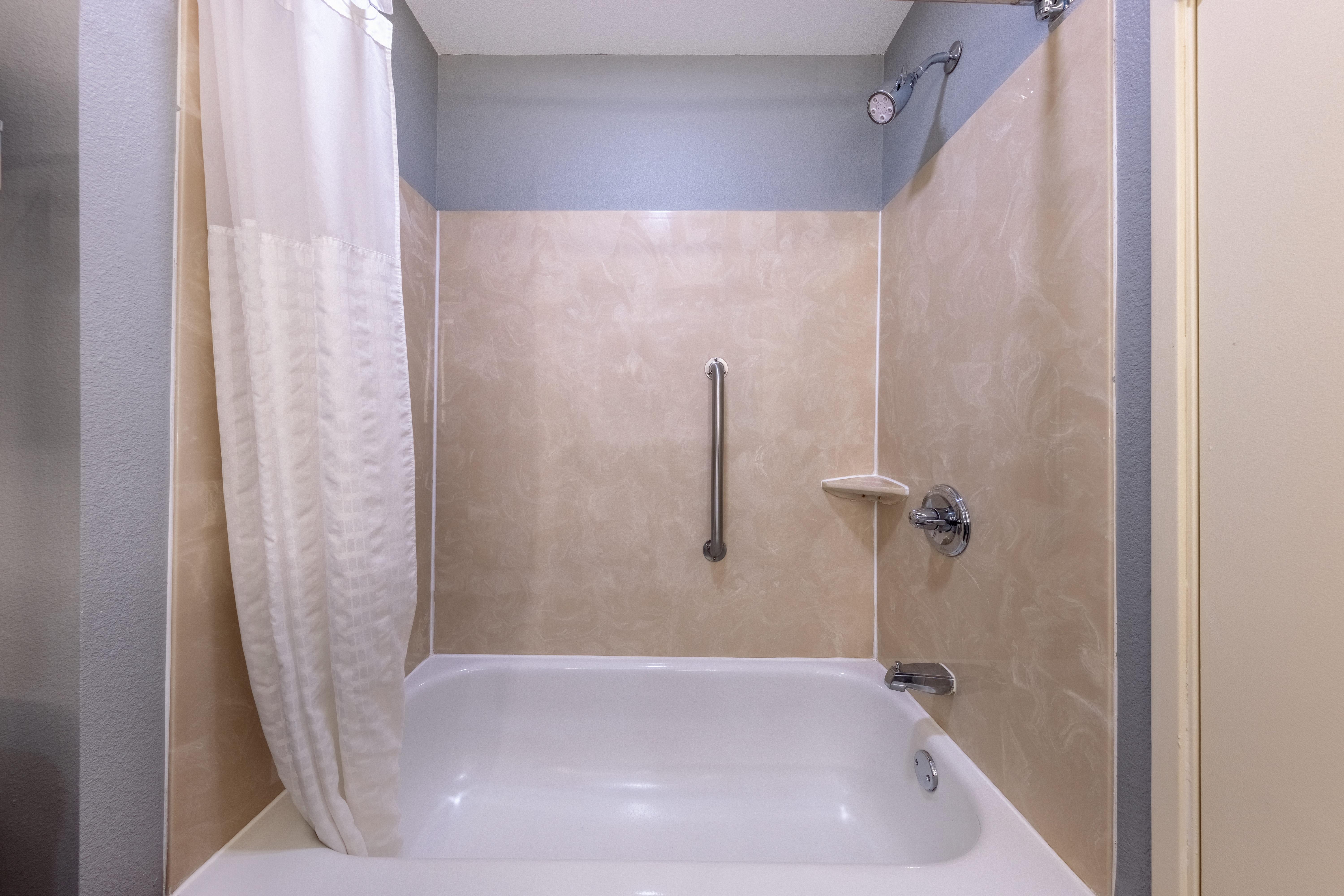 Guest room bath at the AmericInn by Wyndham Duluth in Duluth, Minnesota
