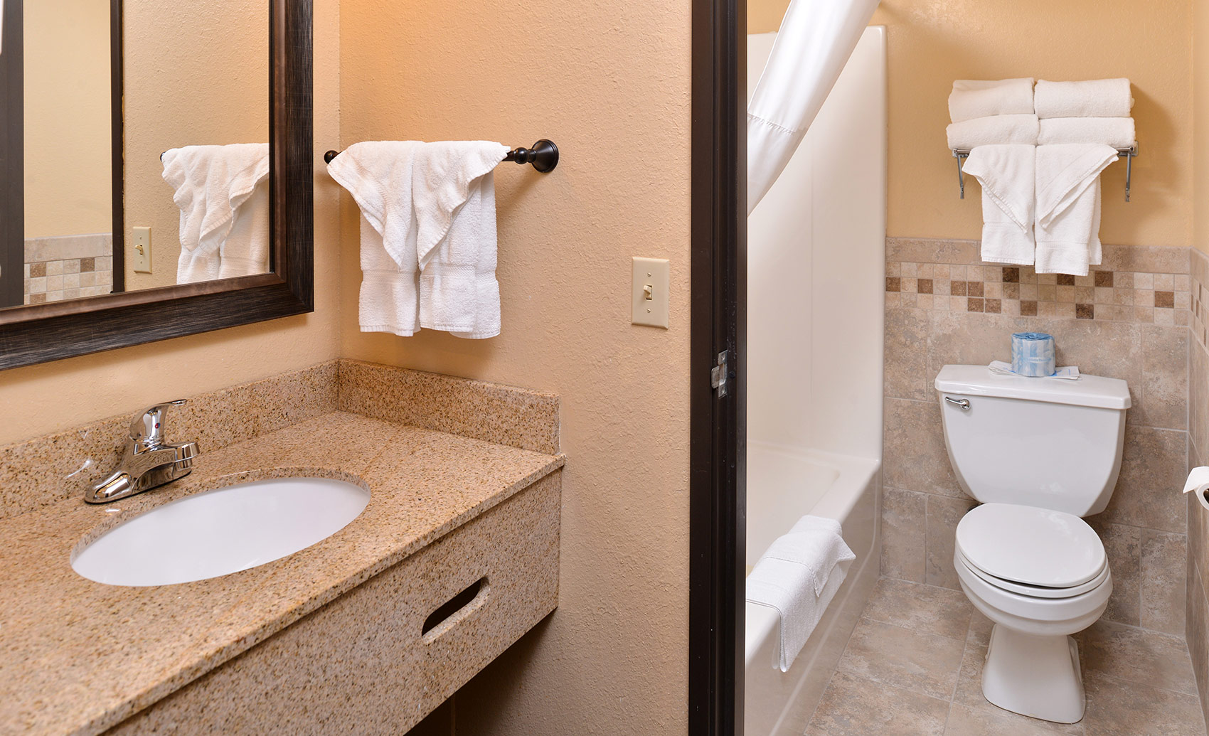 Guest room bath at the AmericInn by Wyndham Fergus Falls Conference Center in Fergus Falls, Minnesota