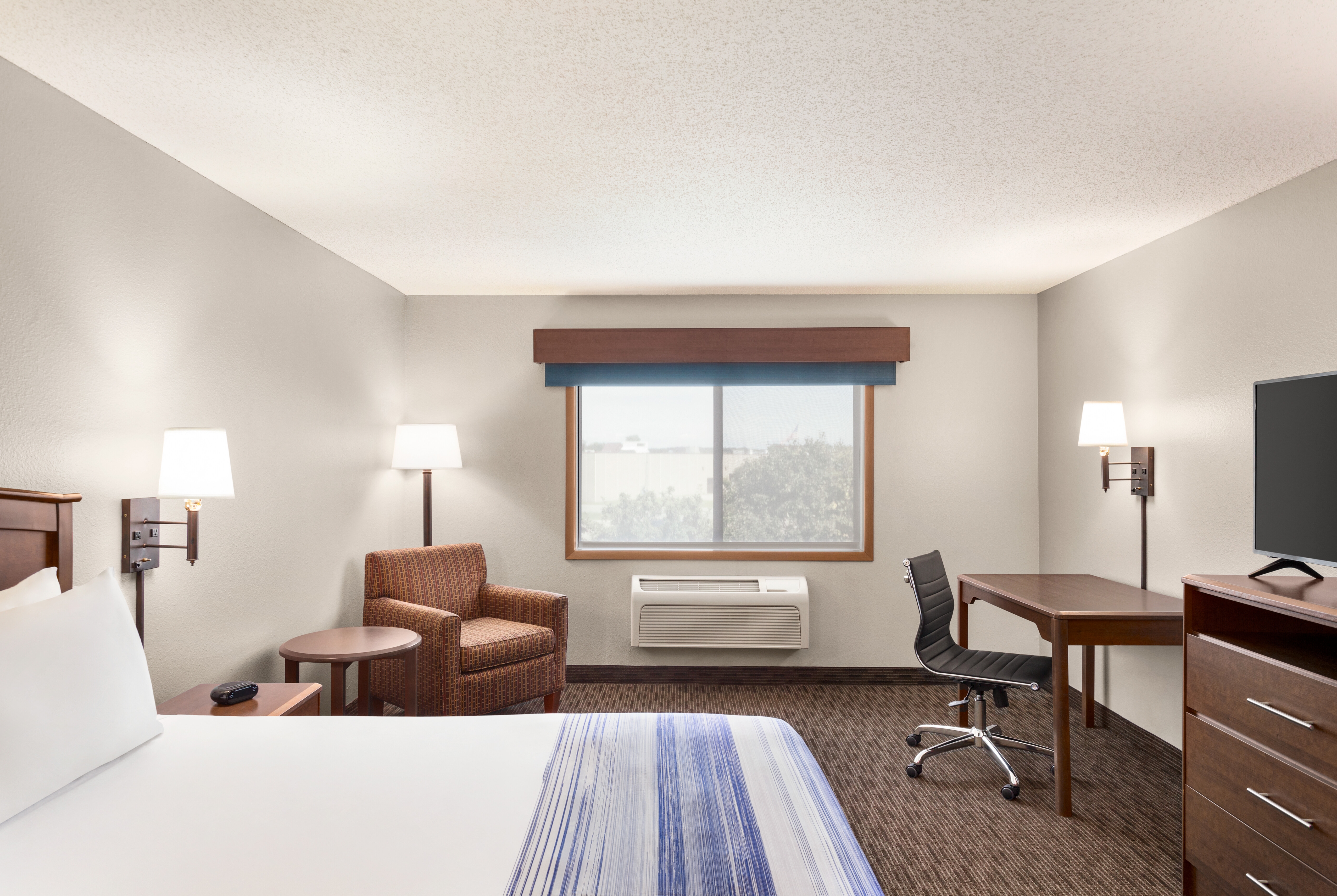 Guest room at the AmericInn by Wyndham Fergus Falls Conference Center in Fergus Falls, Minnesota