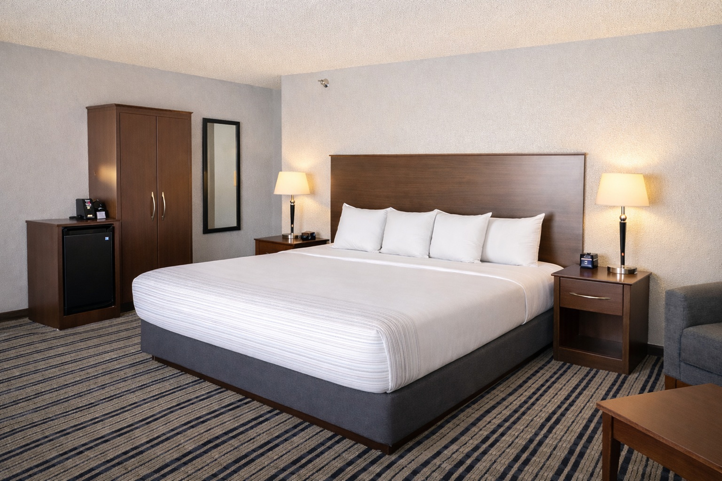 Guest room at the AmericInn by Wyndham Fergus Falls Conference Center in Fergus Falls, Minnesota