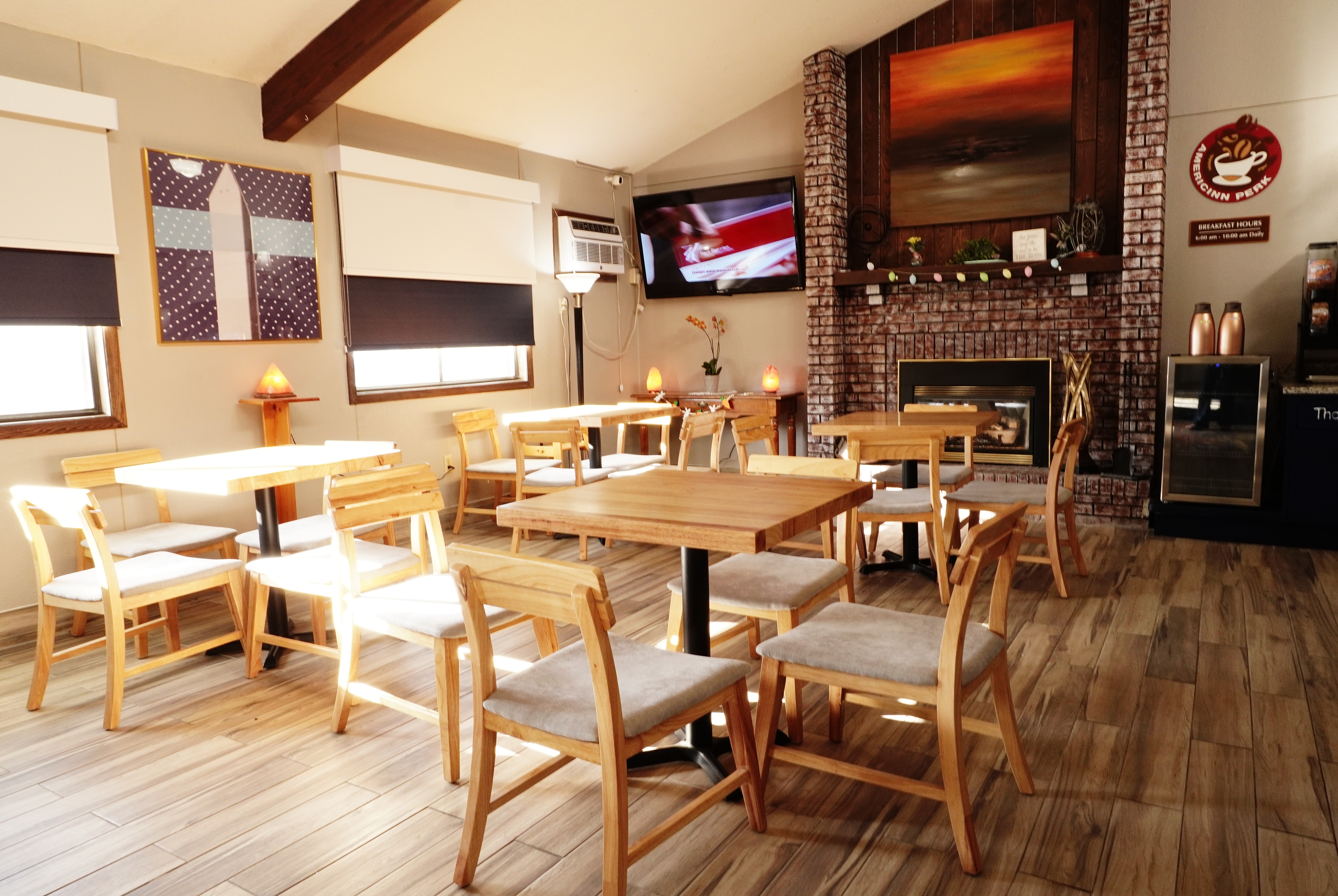 AmericInn by Wyndham Forest Lake restaurant breakfast area with seating in Forest Lake, Minnesota