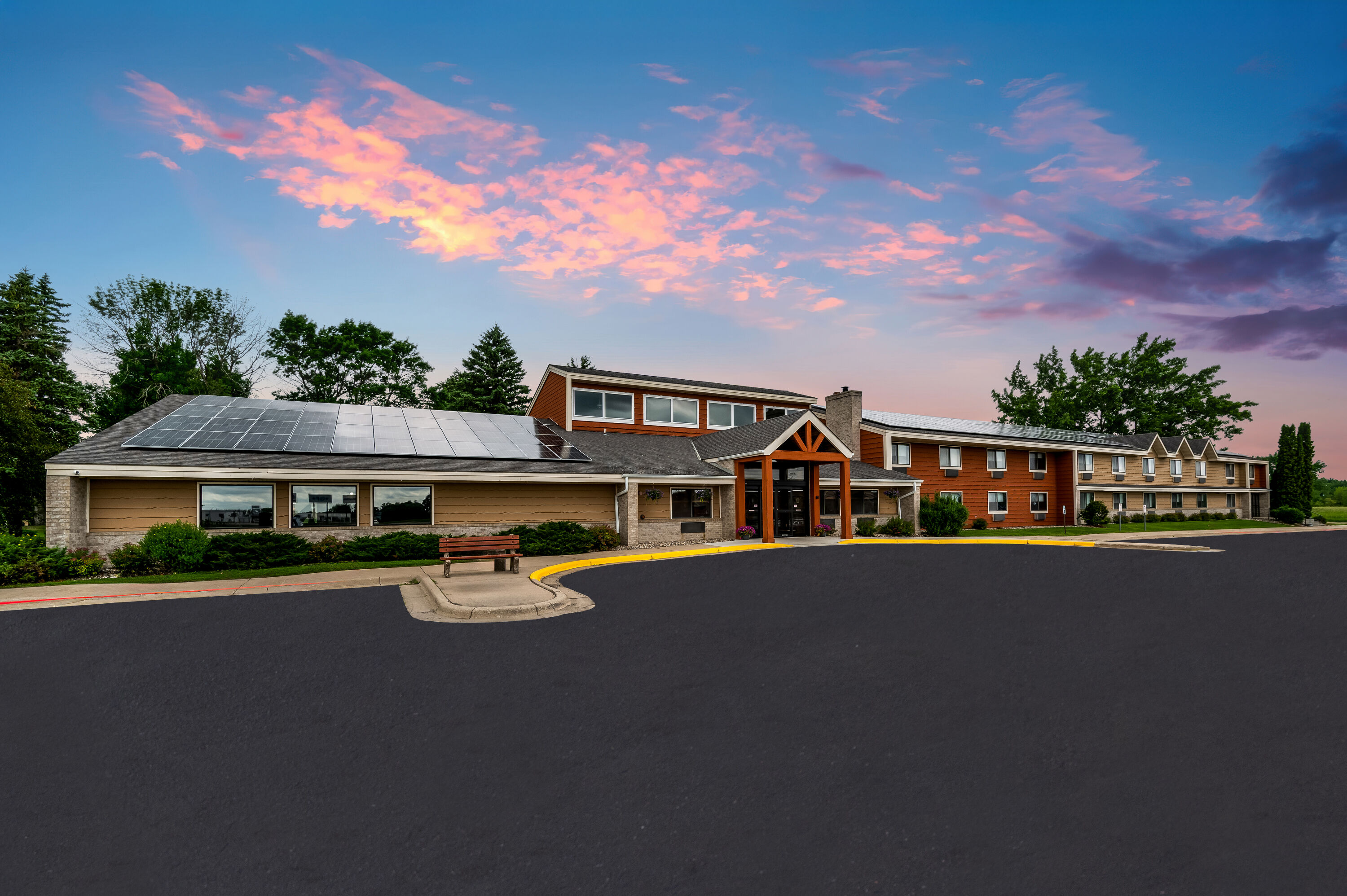 Exterior Dusk Image of AmericInn by Wyndham Hutchinson hotel in Hutchinson, Minnesota