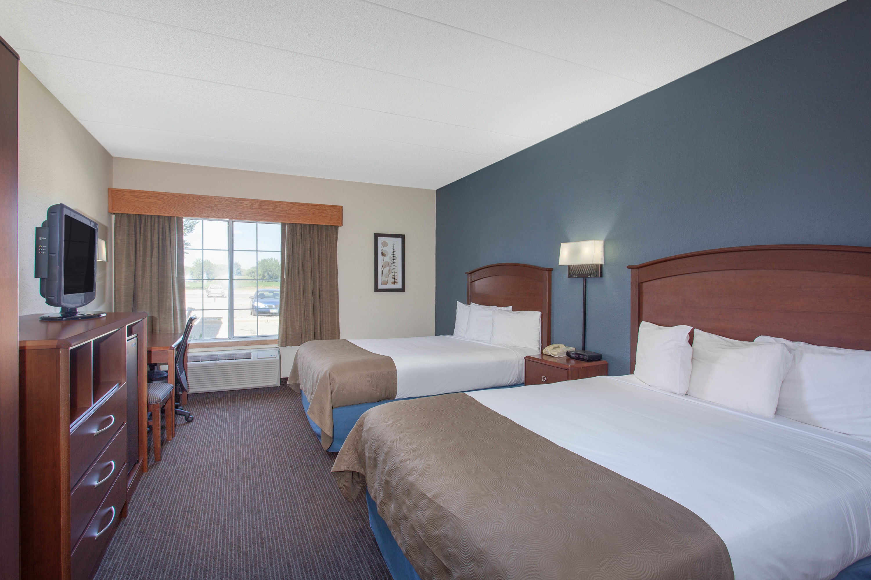 Guest room at the AmericInn by Wyndham Hutchinson in Hutchinson, Minnesota