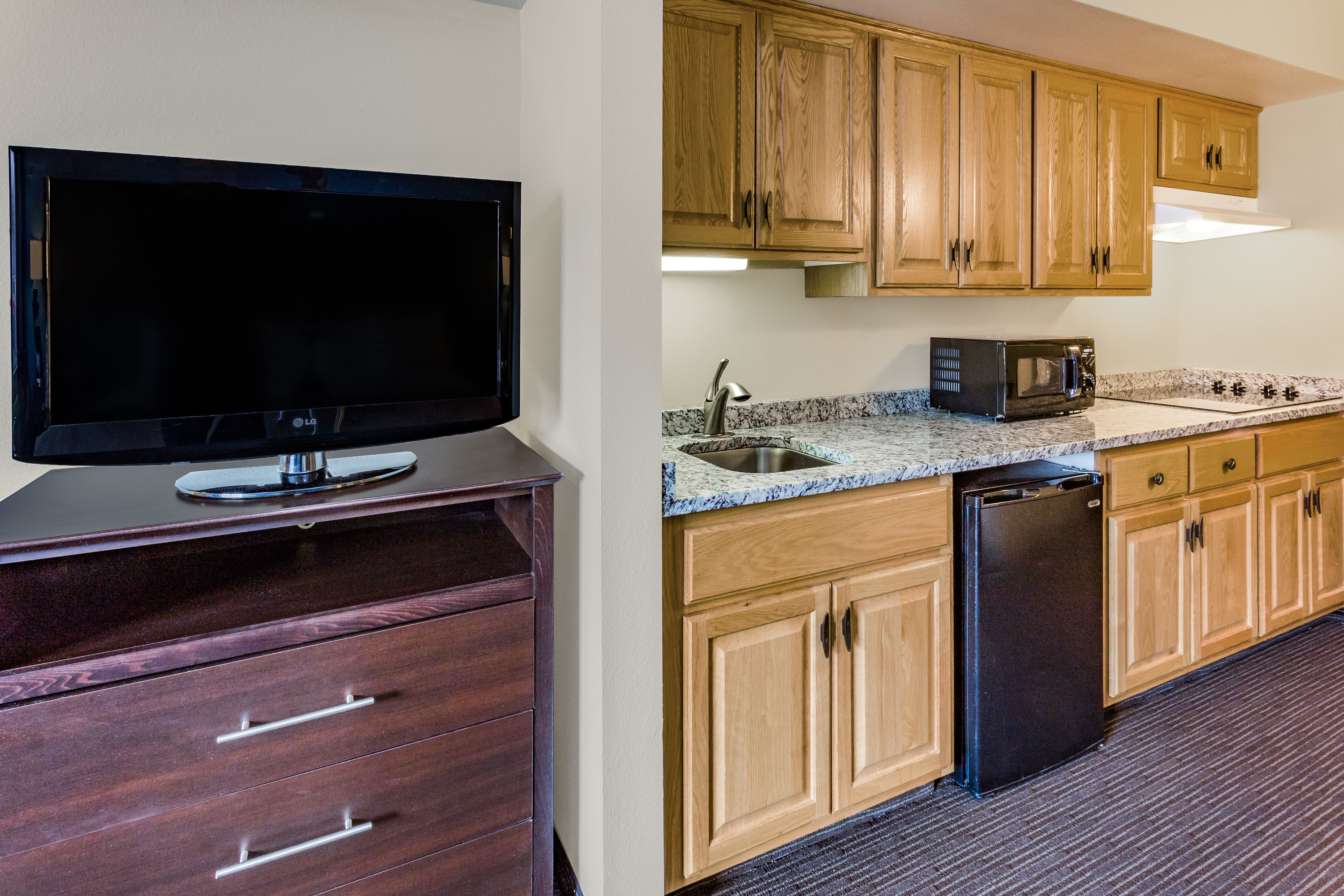 AmericInn by Wyndham Hotel and Suites Long Lake suite kitchen in Long Lake, Minnesota