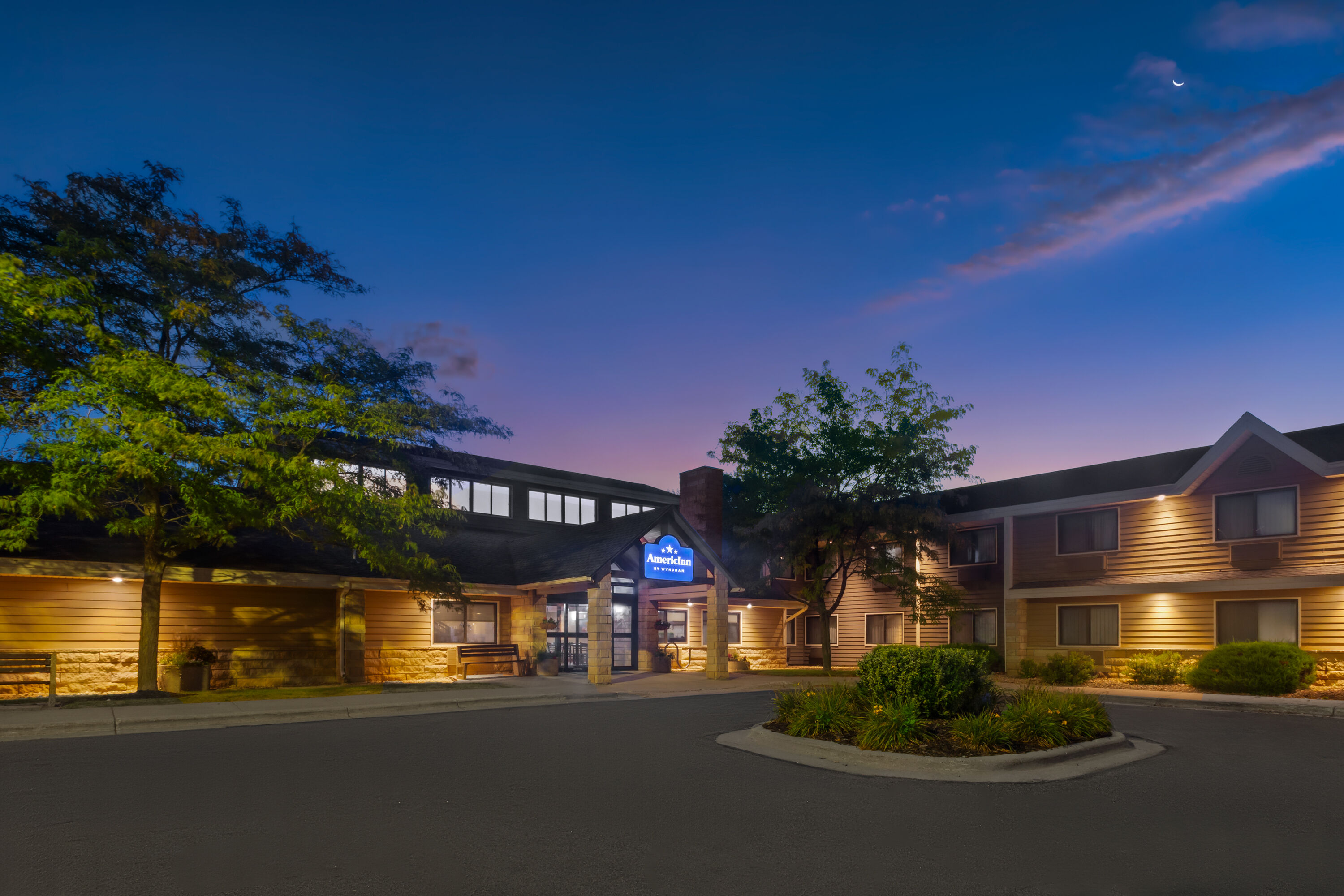 Exterior Dusk Image of AmericInn by Wyndham Mankato Event Center hotel in Mankato, Minnesota