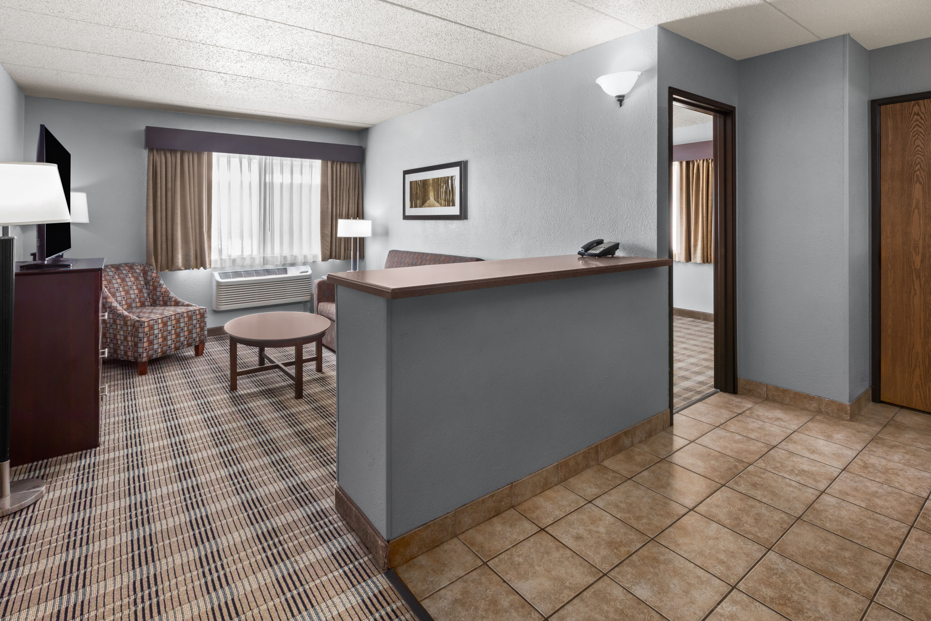Guest room at the AmericInn by Wyndham Mankato Event Center in Mankato, Minnesota