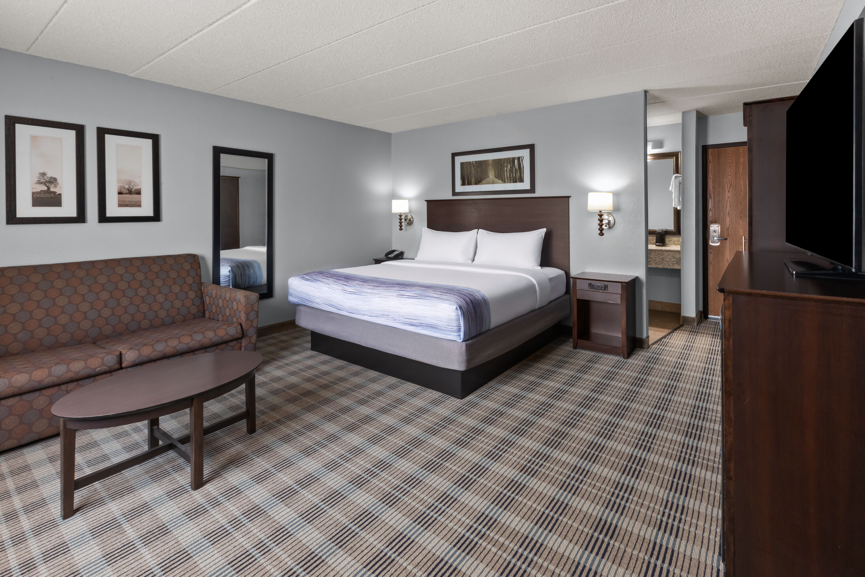 Guest room at the AmericInn by Wyndham Mankato Event Center in Mankato, Minnesota