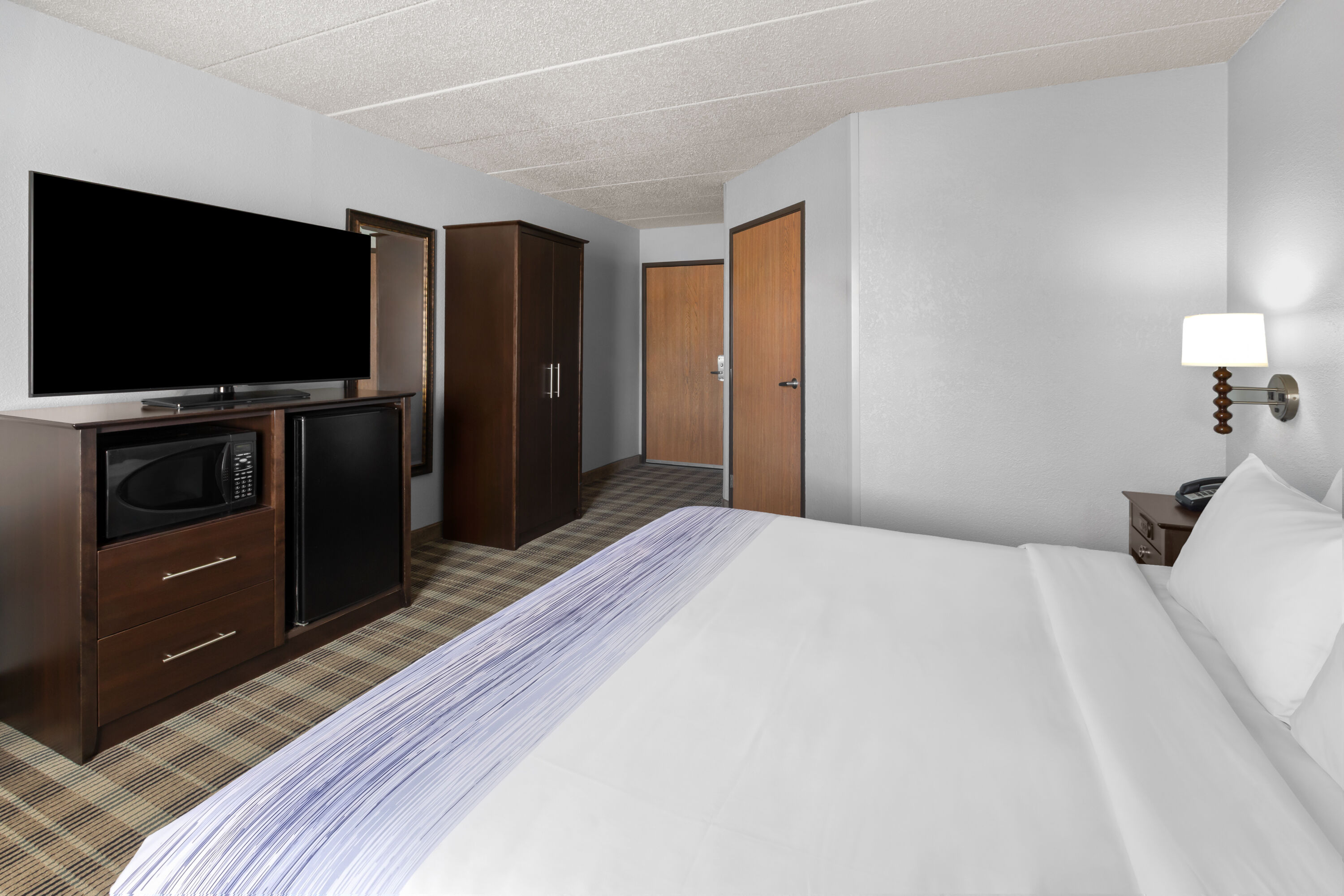 Guest room at the AmericInn by Wyndham Mankato Event Center in Mankato, Minnesota