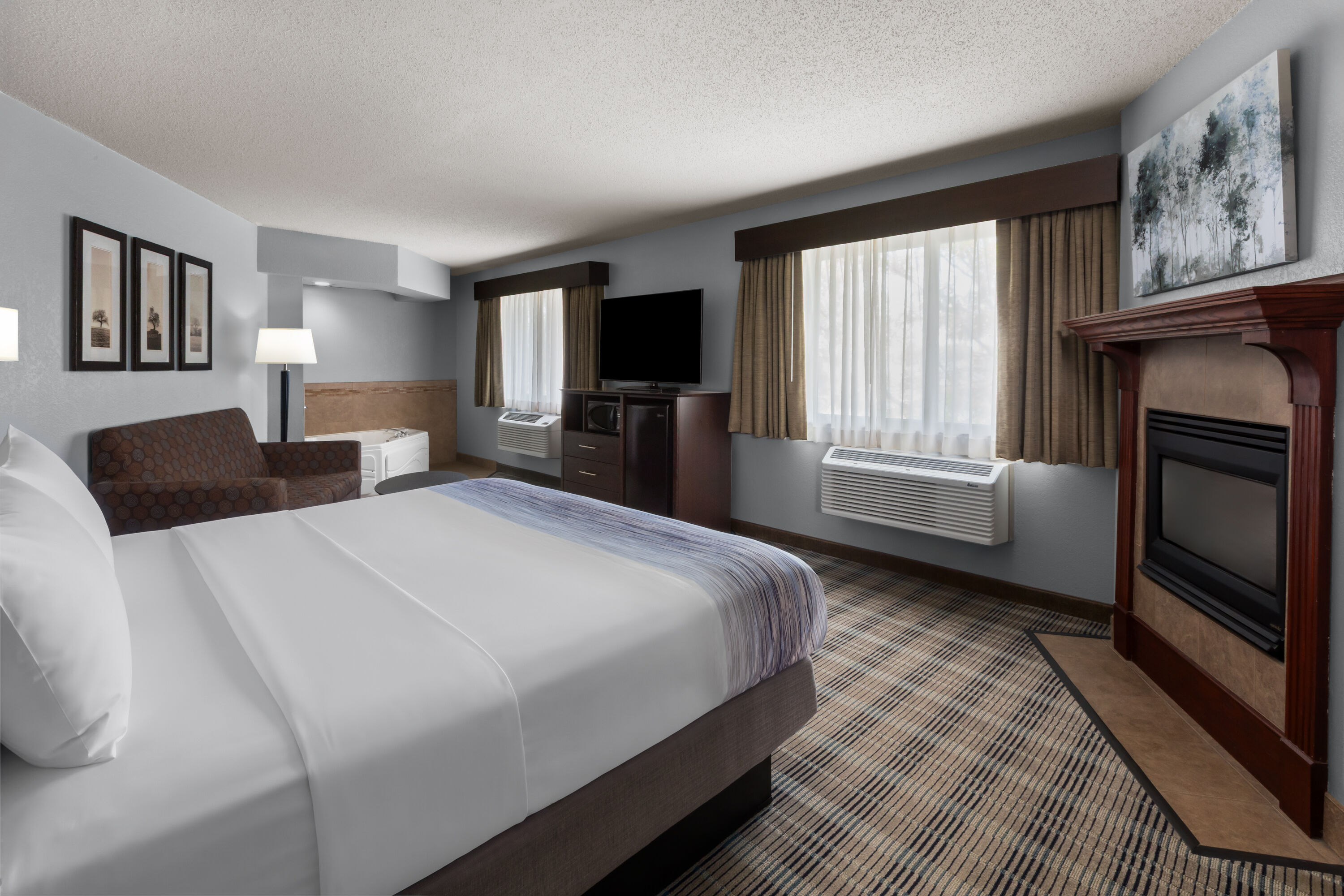 Guest room at the AmericInn by Wyndham Mankato Event Center in Mankato, Minnesota