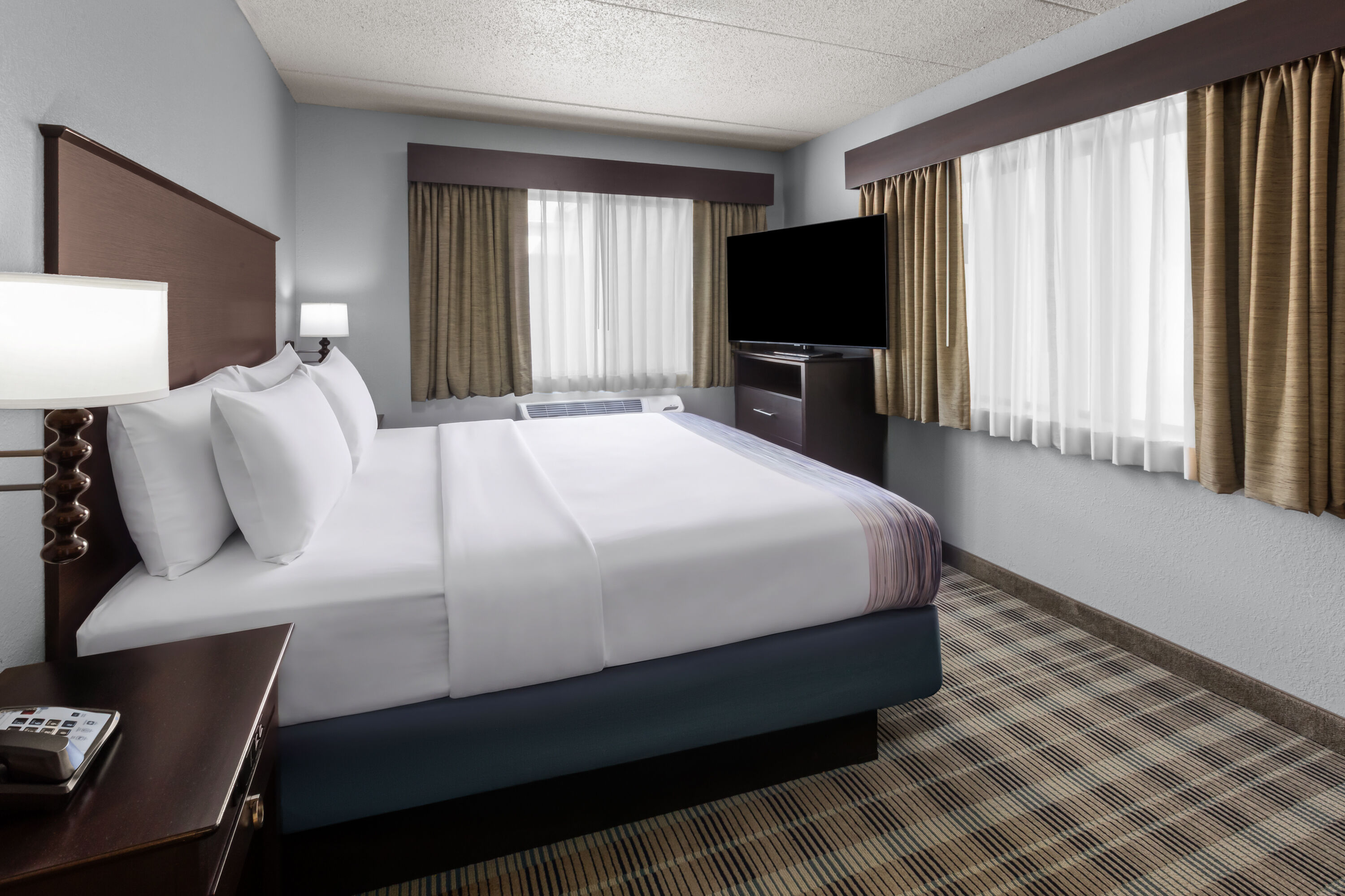 Guest room at the AmericInn by Wyndham Mankato Event Center in Mankato, Minnesota