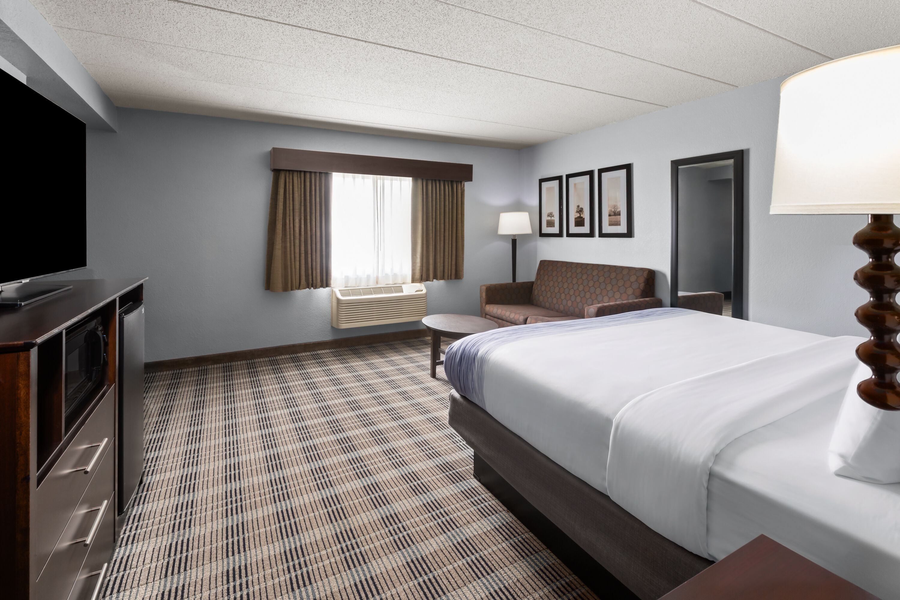 Guest room at the AmericInn by Wyndham Mankato Event Center in Mankato, Minnesota