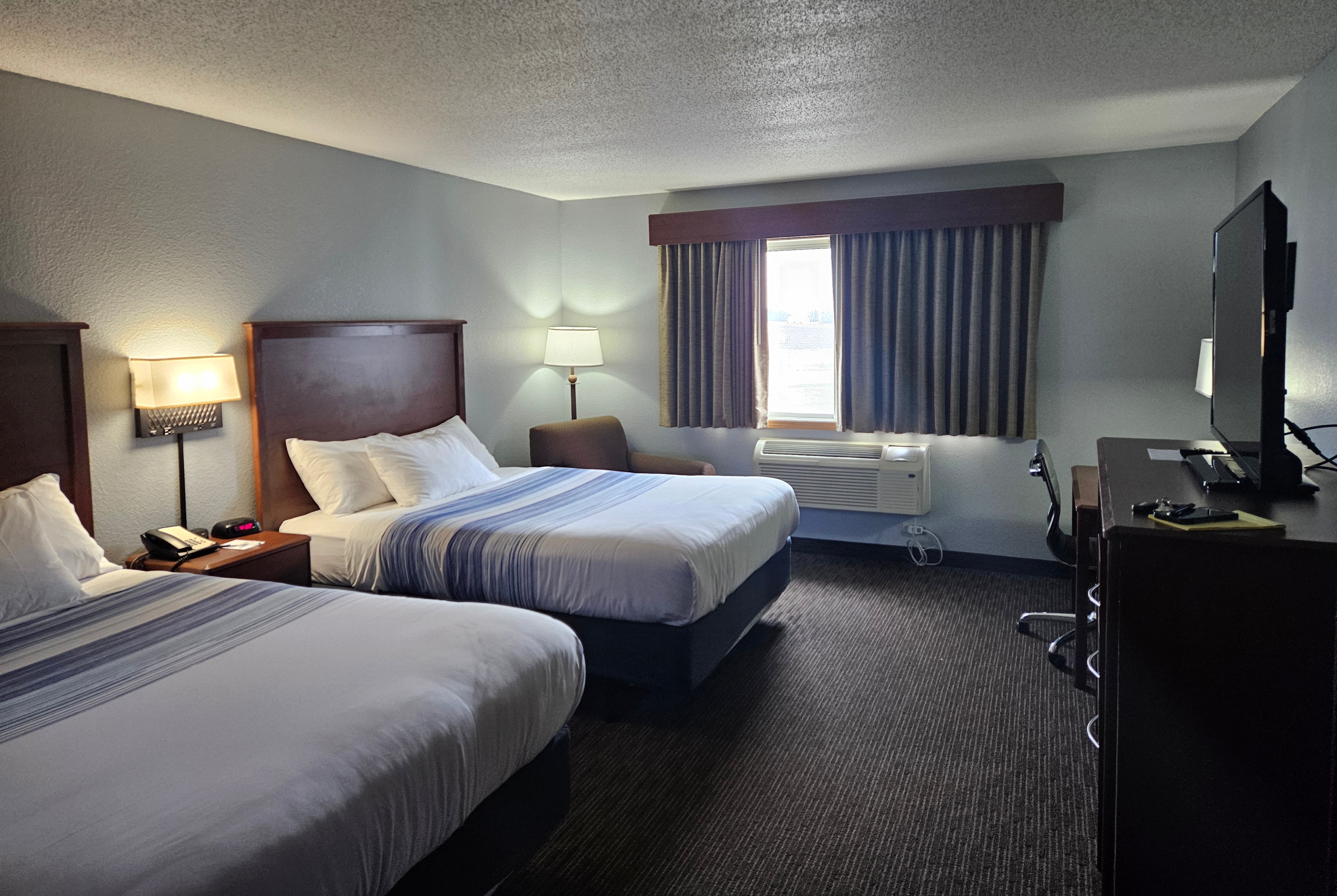 Guest room at the AmericInn by Wyndham Marshall in Marshall, Minnesota