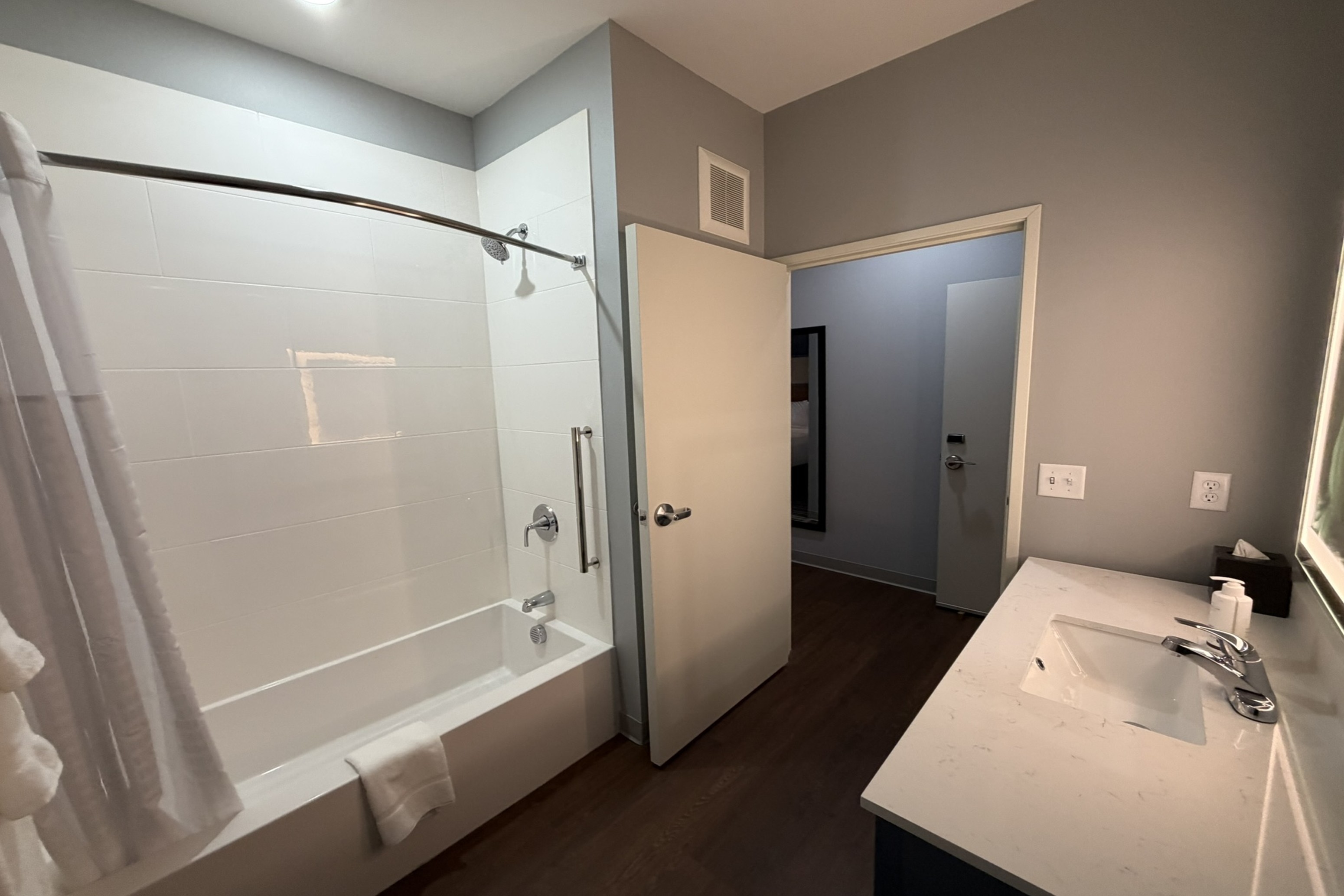 Guest room bath at the AmericInn by Wyndham Mountain Lake MN in Mountain Lake, Minnesota