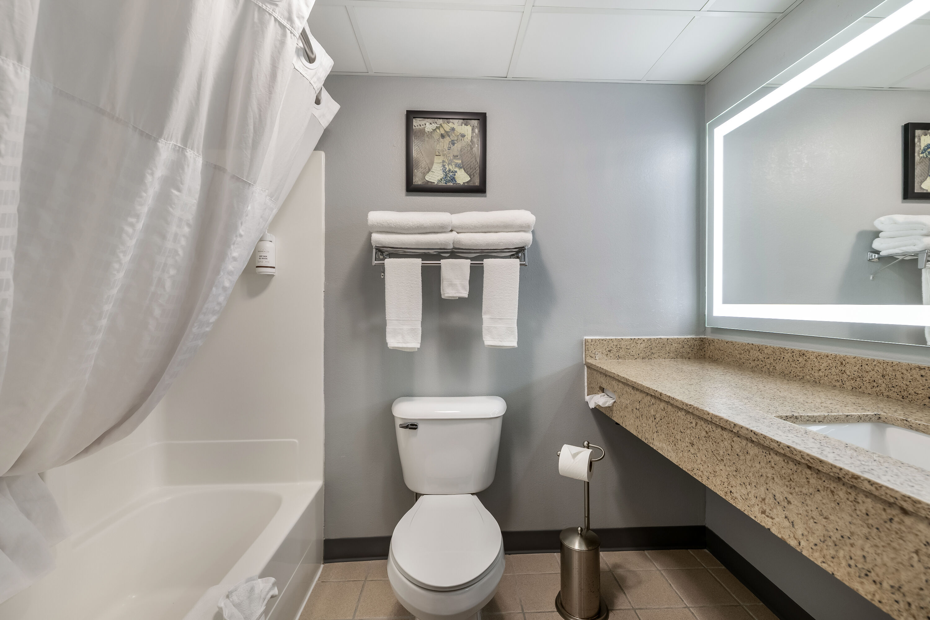 Guest room bath at the AmericInn by Wyndham Stillwater in Oak Park Heights, Minnesota