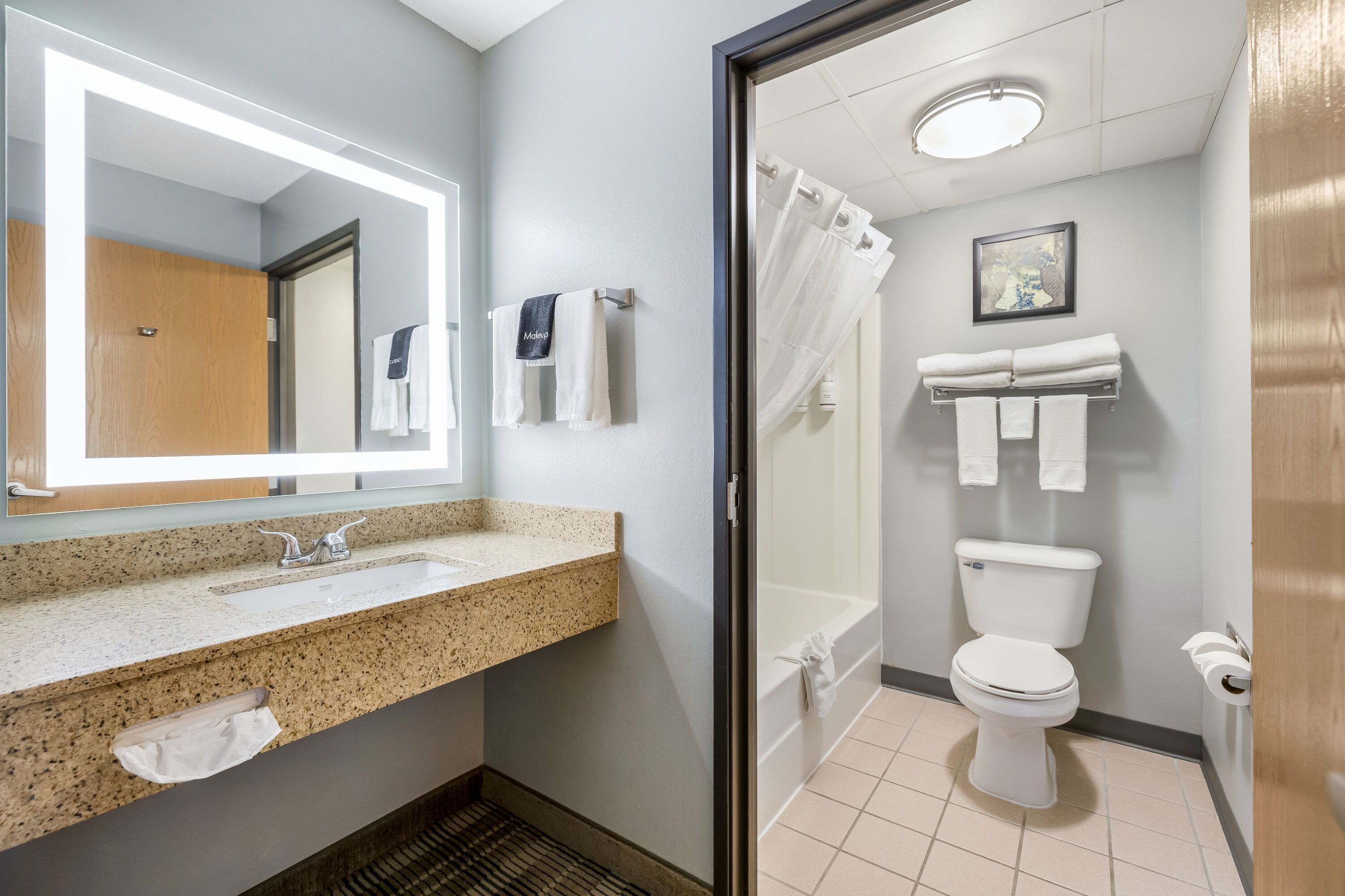 Guest room bath at the AmericInn by Wyndham Stillwater in Oak Park Heights, Minnesota