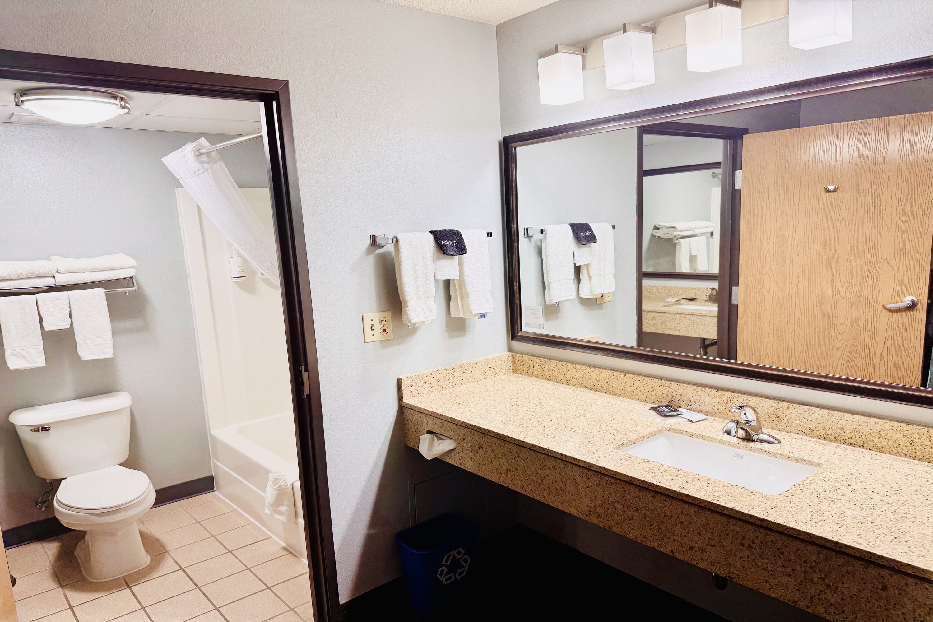 Guest room bath at the AmericInn by Wyndham Stillwater in Oak Park Heights, Minnesota
