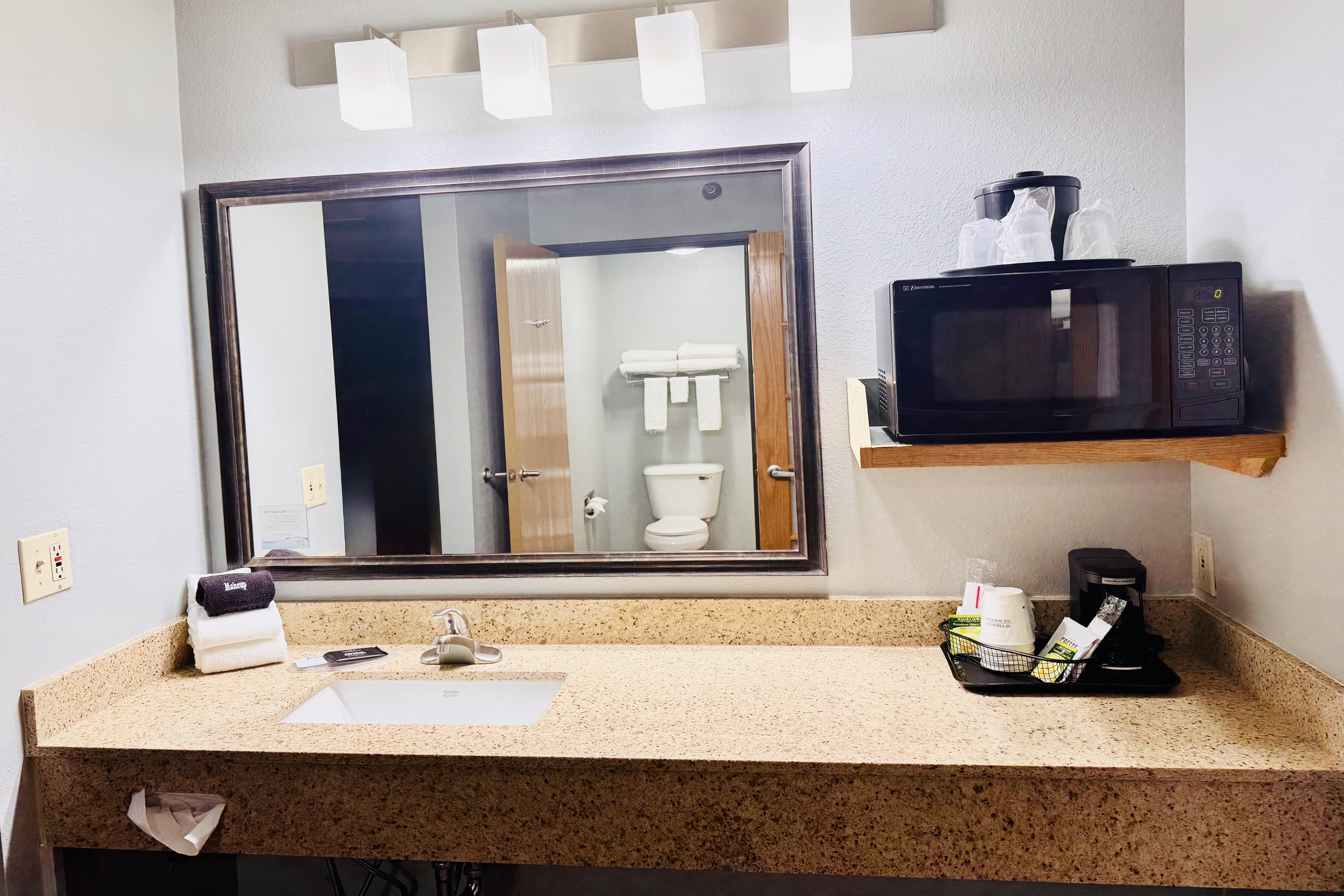 Guest room bath at the AmericInn by Wyndham Stillwater in Oak Park Heights, Minnesota