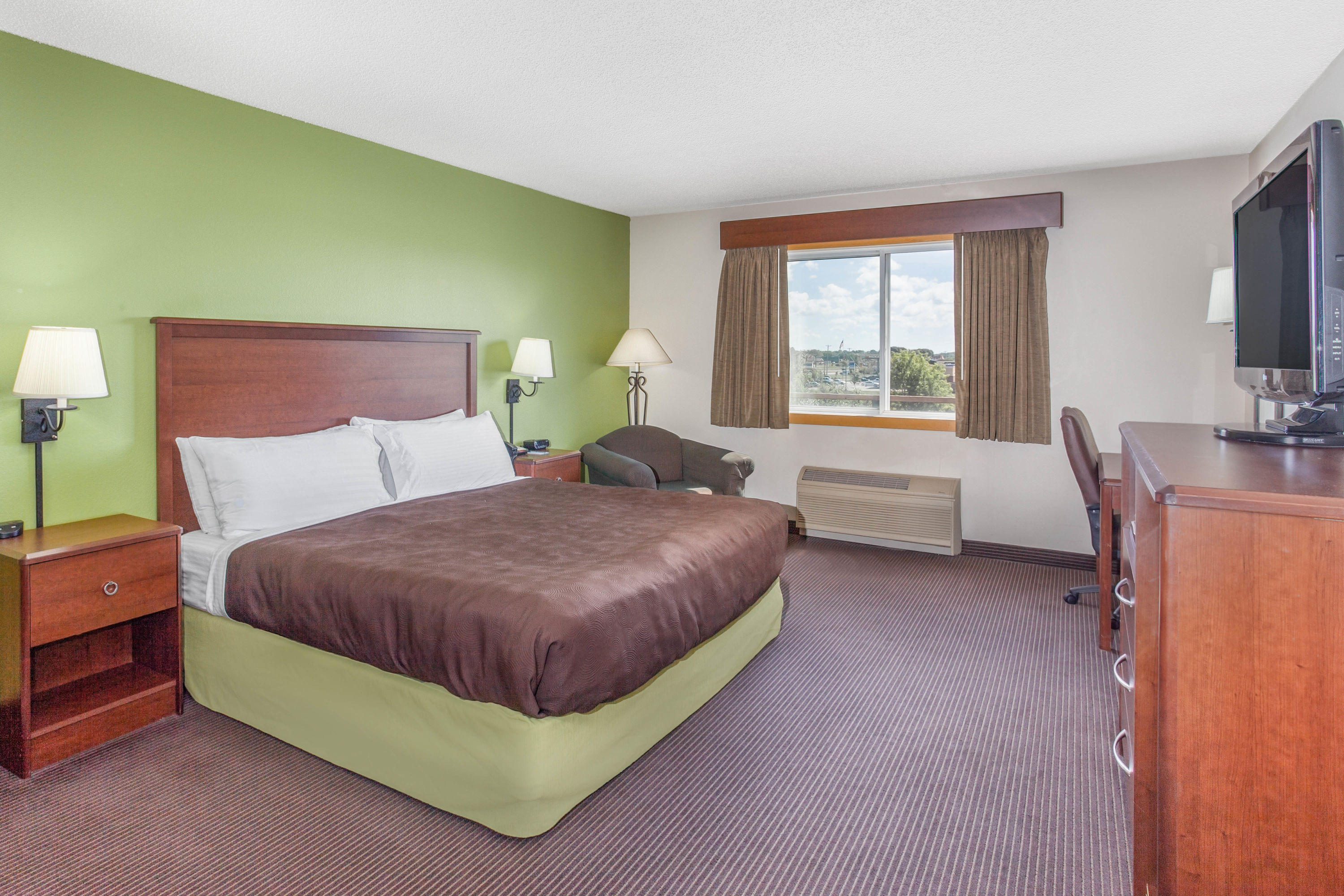 Guest room at the AmericInn by Wyndham Stillwater in Oak Park Heights, Minnesota