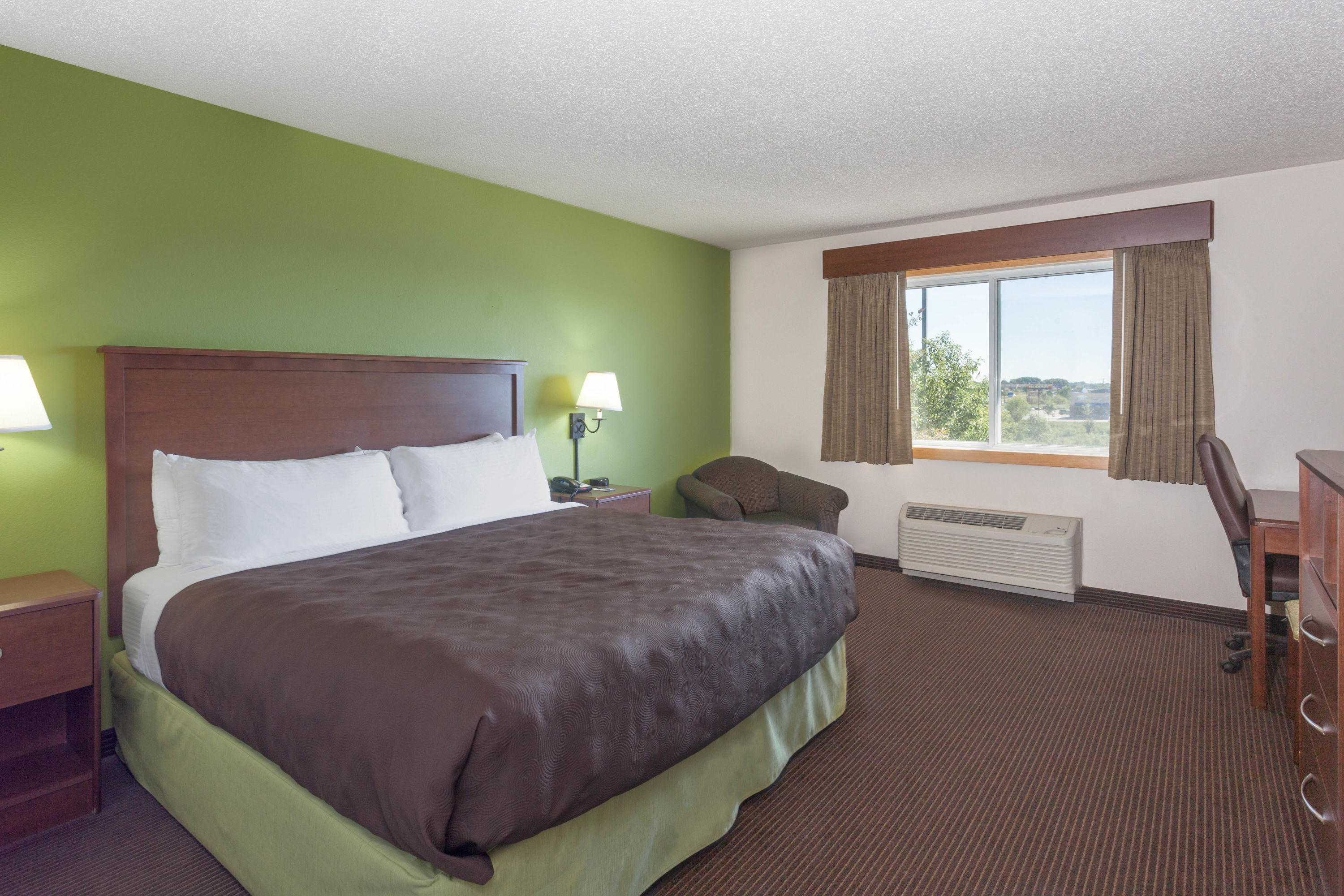 Guest room at the AmericInn by Wyndham Stillwater in Oak Park Heights, Minnesota