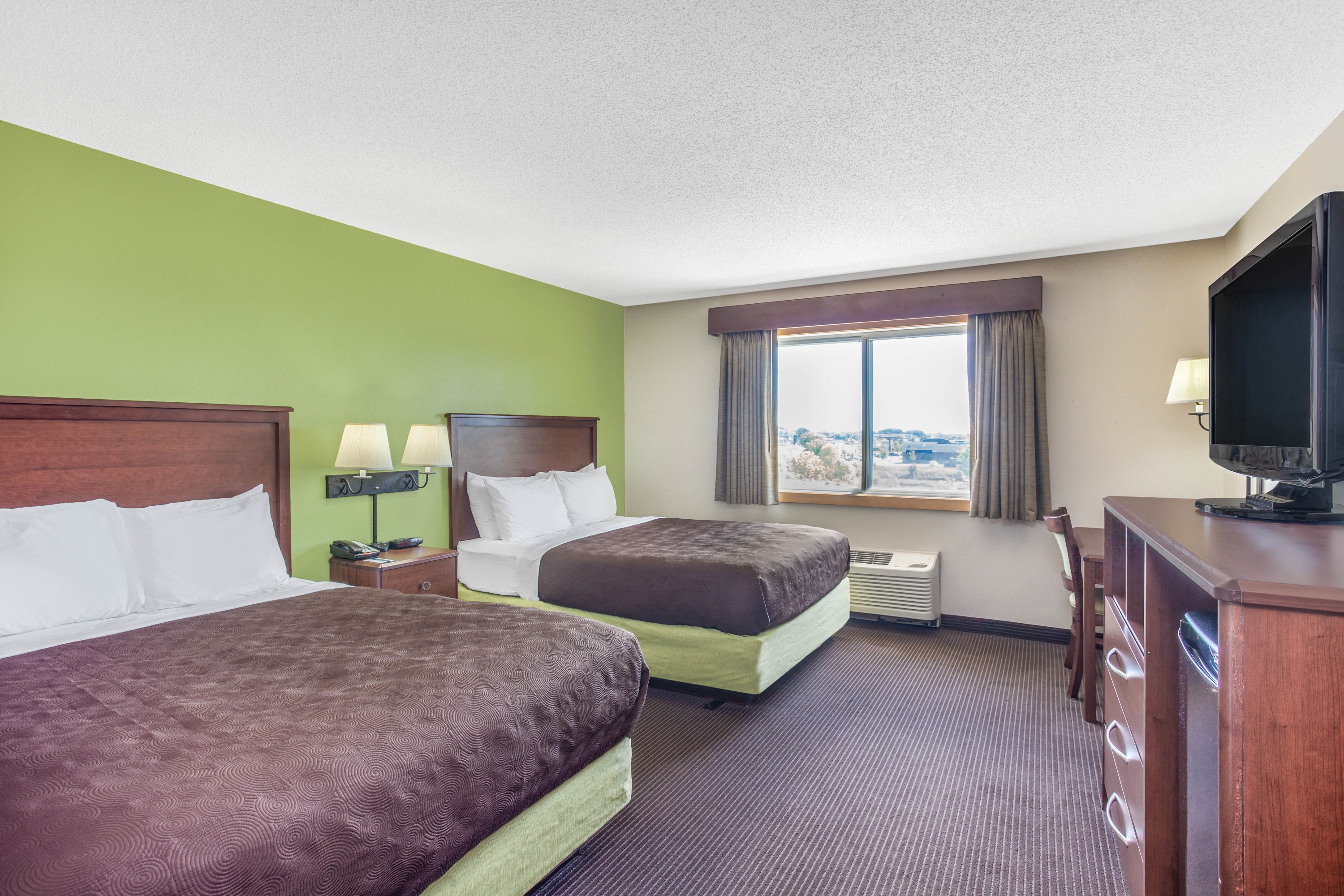 Guest room at the AmericInn by Wyndham Stillwater in Oak Park Heights, Minnesota