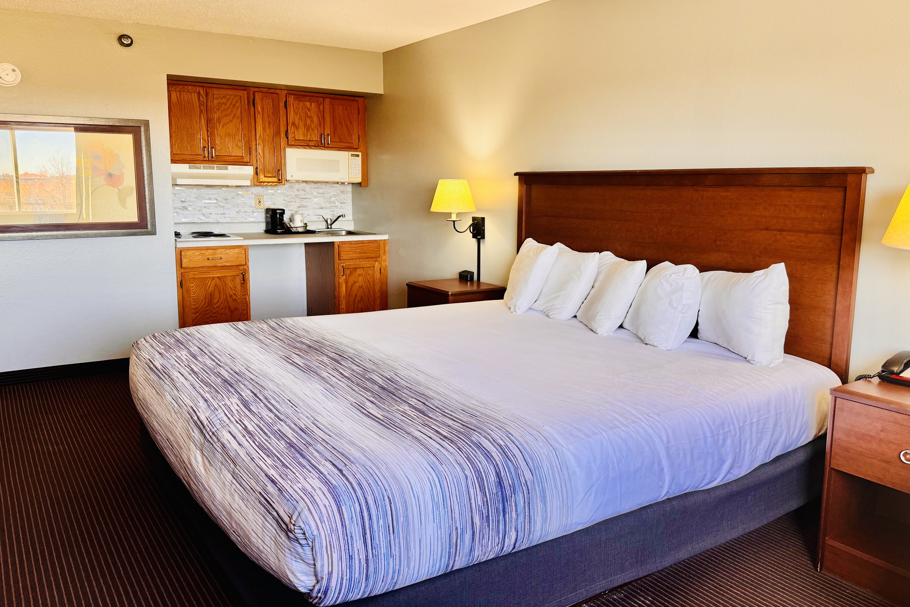 Guest room at the AmericInn by Wyndham Stillwater in Oak Park Heights, Minnesota