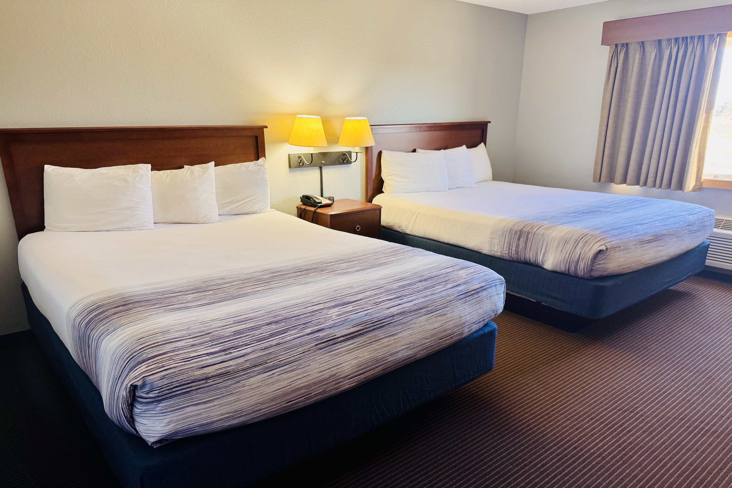 Guest room at the AmericInn by Wyndham Stillwater in Oak Park Heights, Minnesota