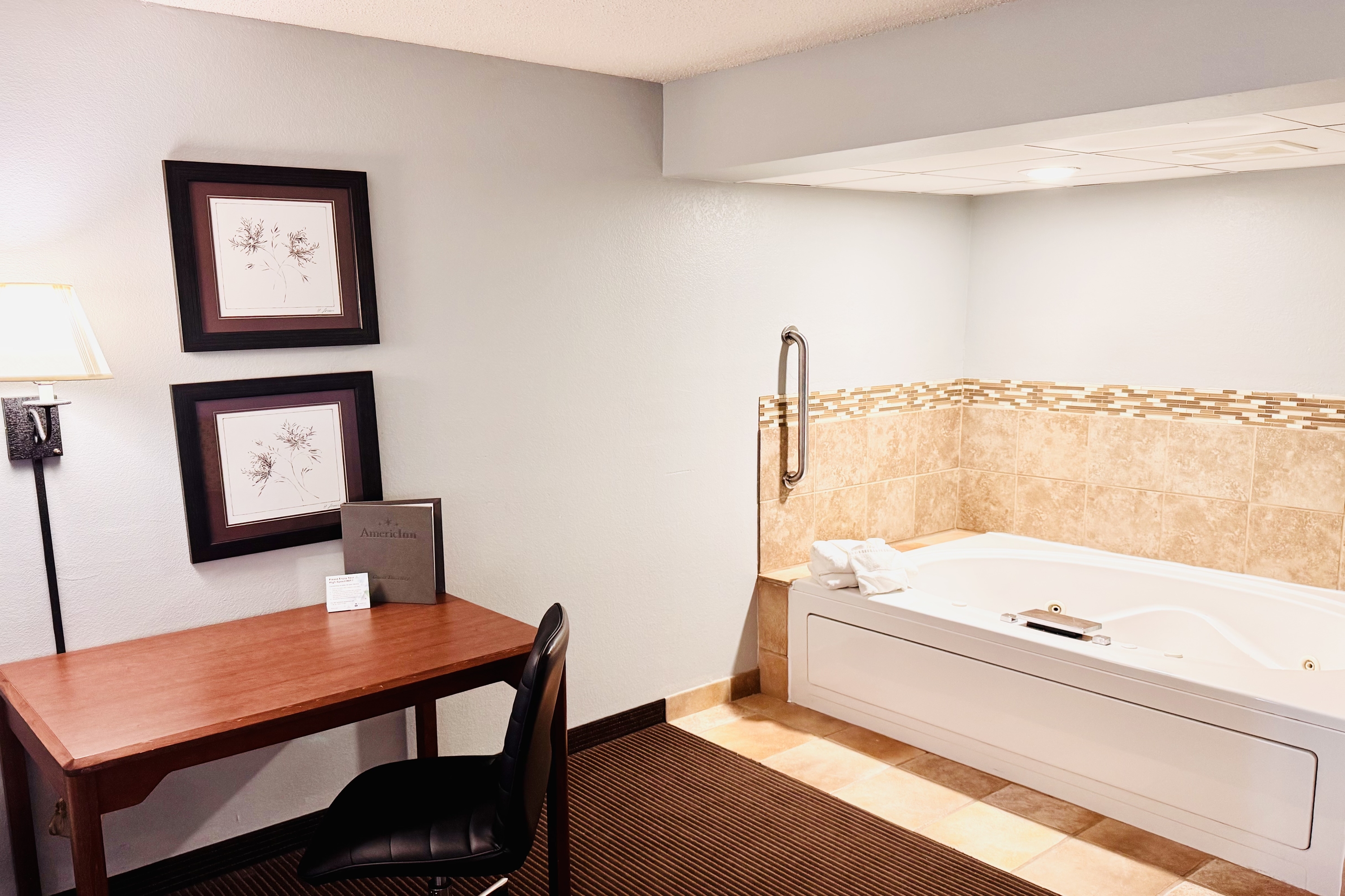 Guest room at the AmericInn by Wyndham Stillwater in Oak Park Heights, Minnesota