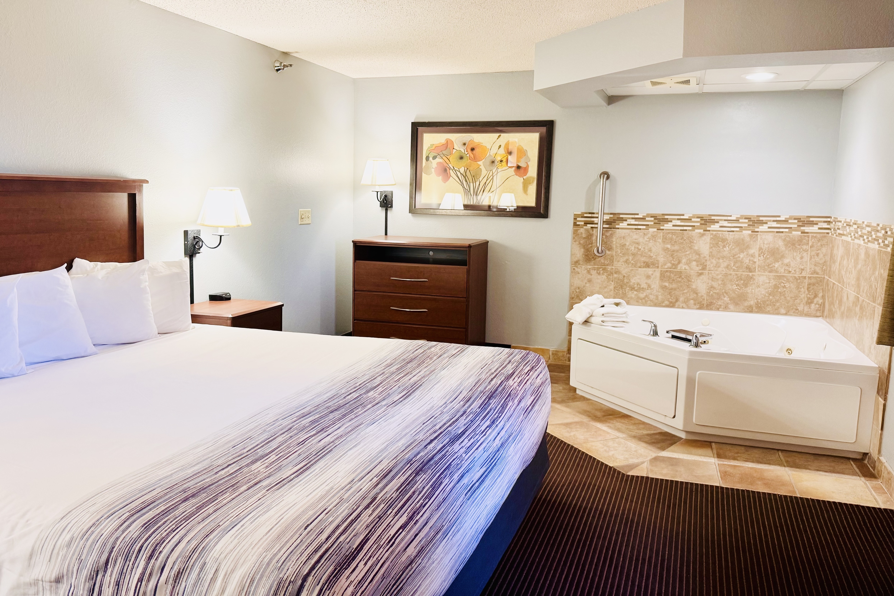 Guest room at the AmericInn by Wyndham Stillwater in Oak Park Heights, Minnesota