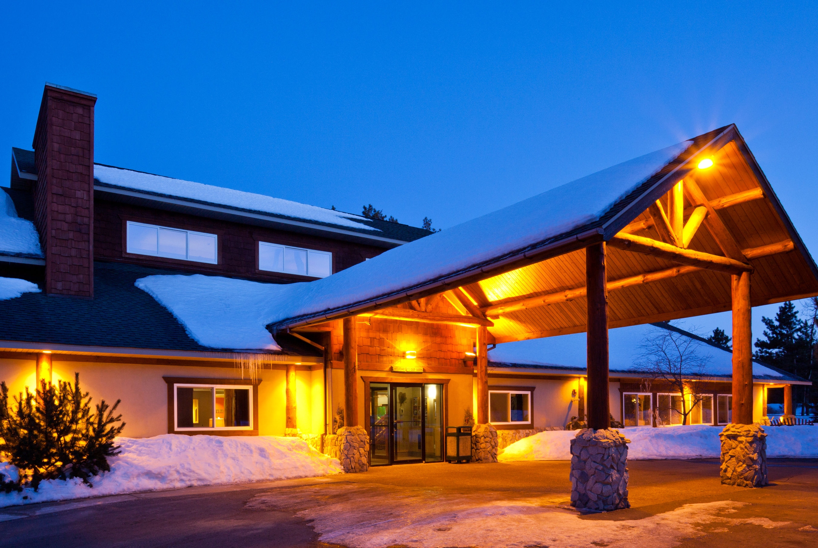 Exterior Dusk Image of AmericInn by Wyndham Pequot Lakes/Jenkins hotel in Pequot Lakes, Minnesota