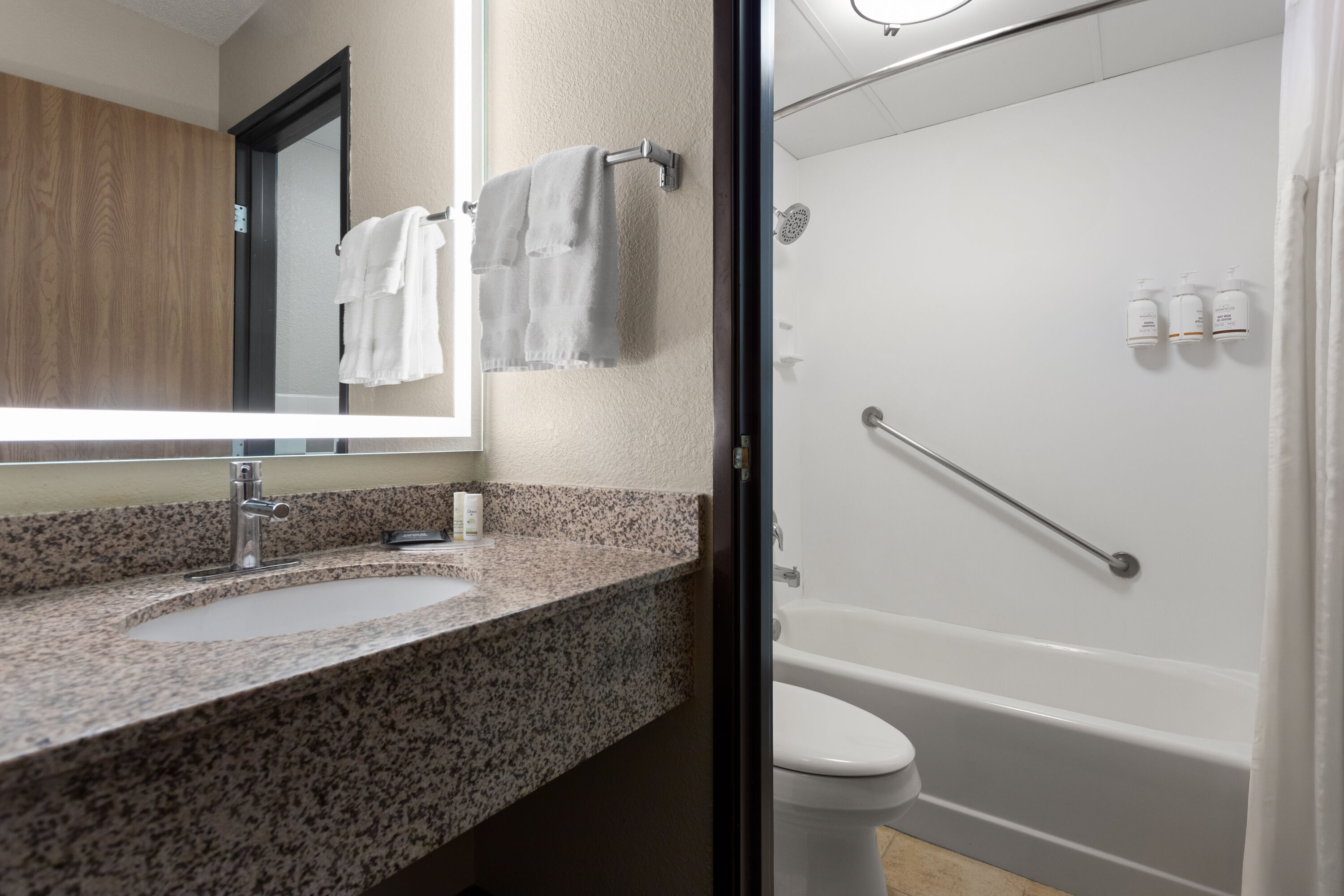 Guest room bath at the AmericInn by Wyndham Roseau in Roseau, Minnesota