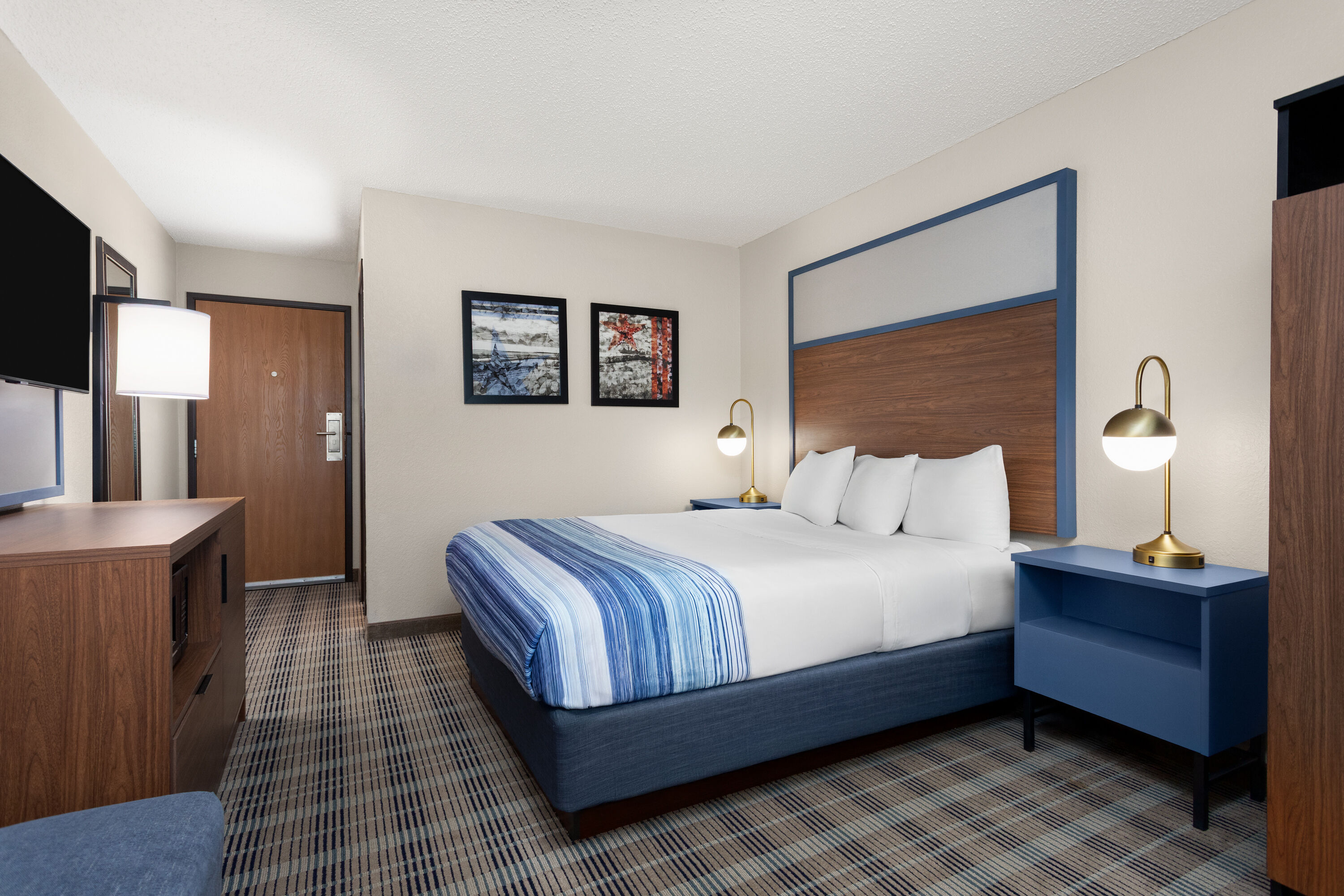 Guest room at the AmericInn by Wyndham Roseau in Roseau, Minnesota