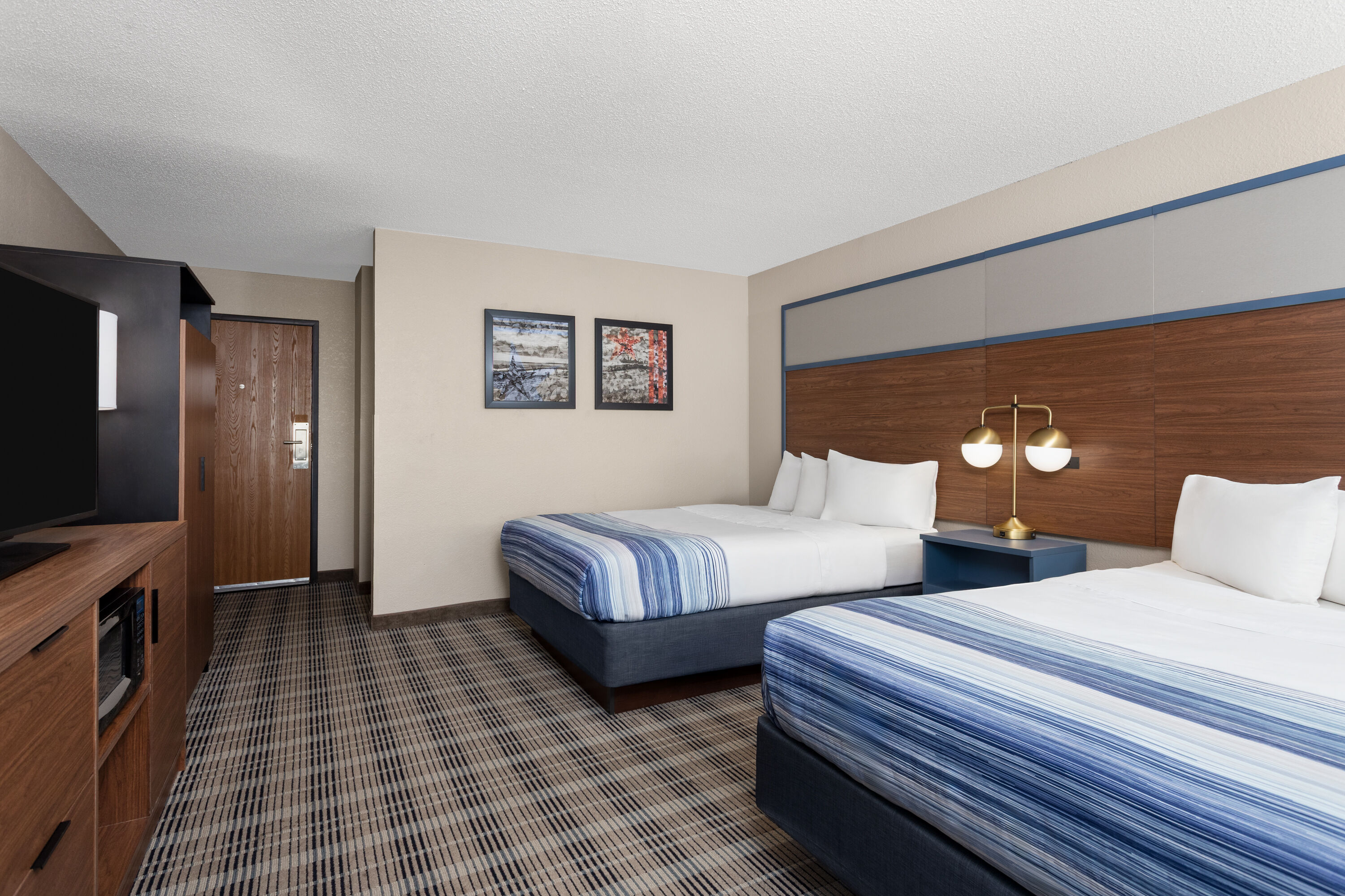 Guest room at the AmericInn by Wyndham Roseau in Roseau, Minnesota