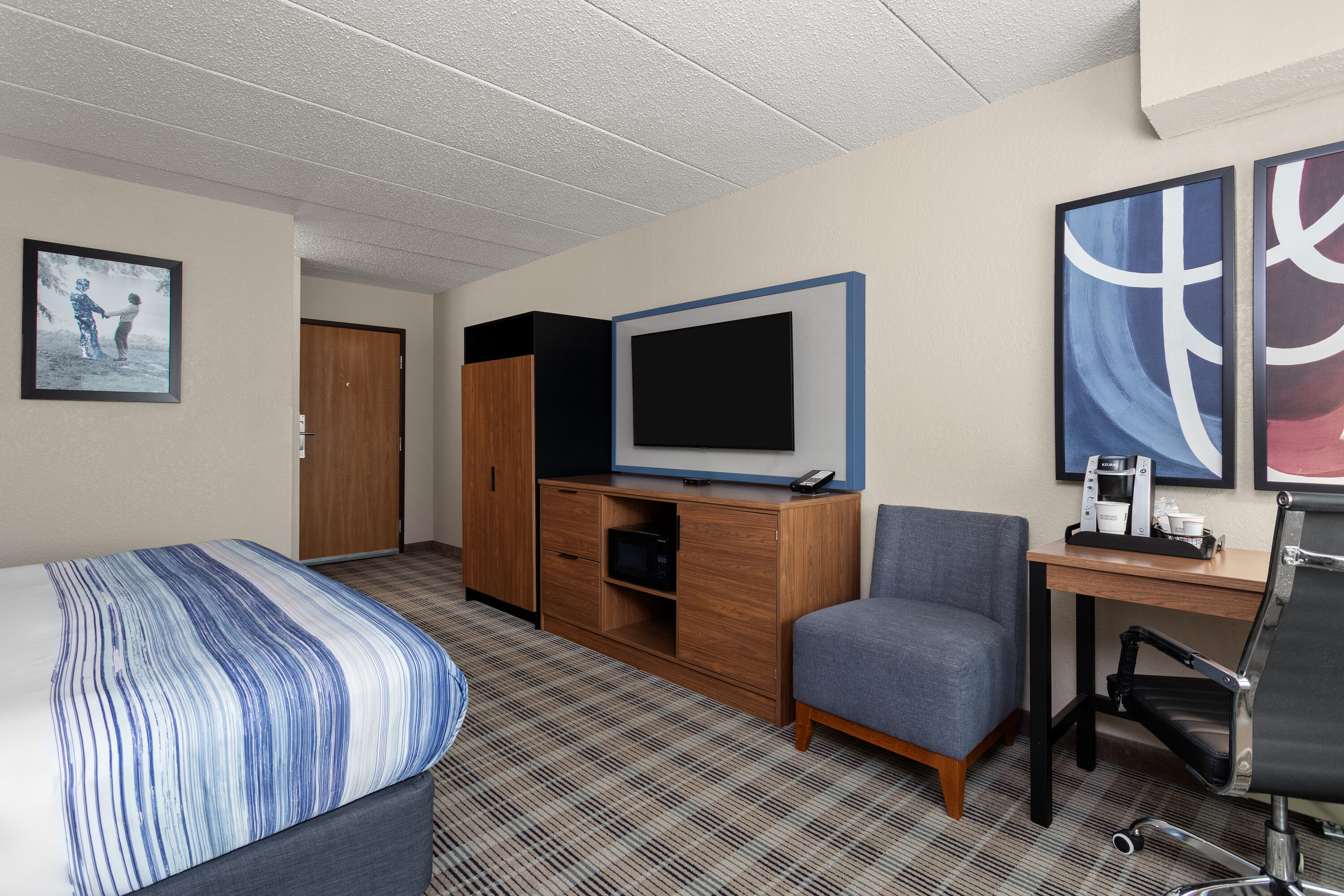 Guest room at the AmericInn by Wyndham Roseau in Roseau, Minnesota
