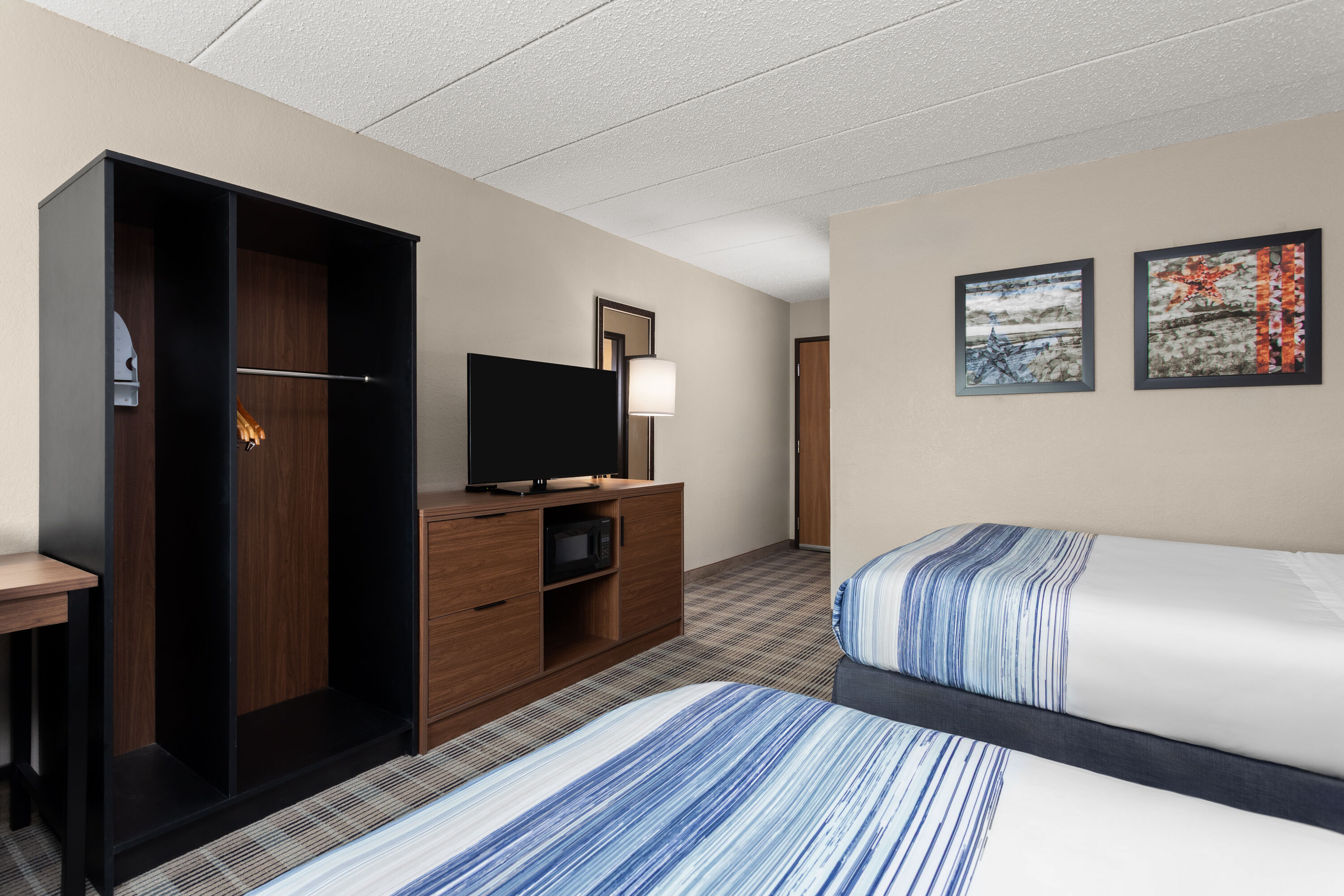Guest room at the AmericInn by Wyndham Roseau in Roseau, Minnesota