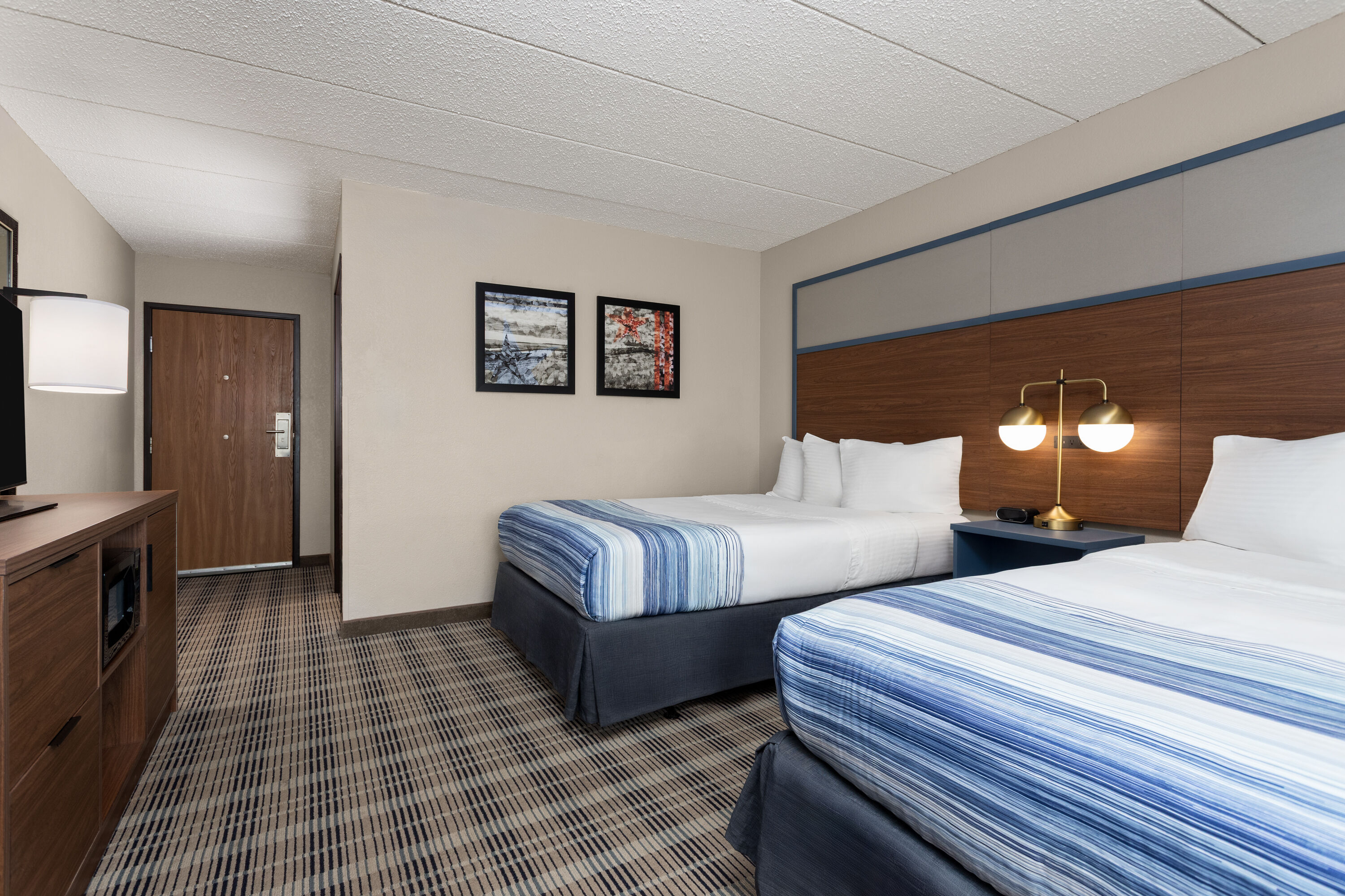 Guest room at the AmericInn by Wyndham Roseau in Roseau, Minnesota