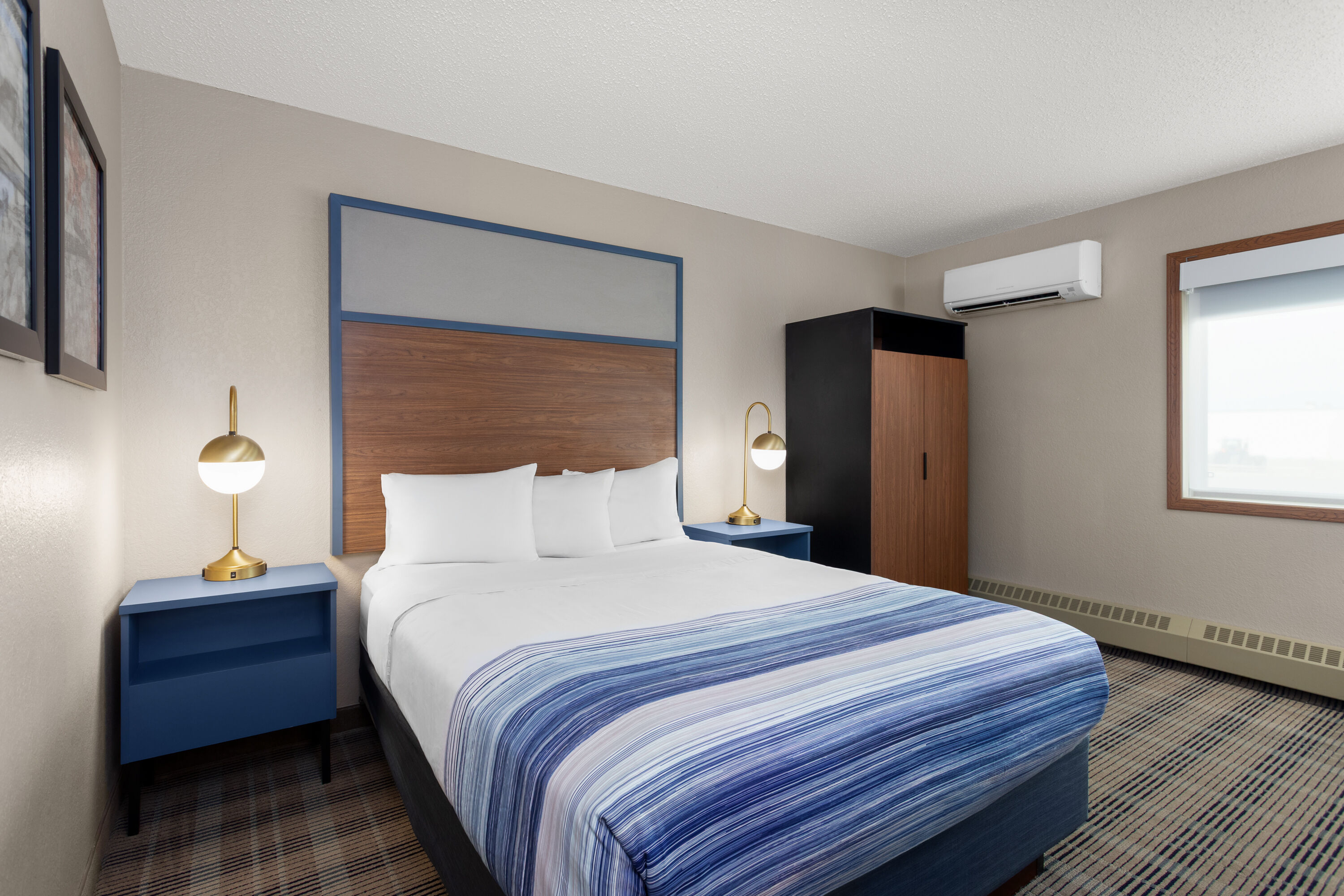 Guest room at the AmericInn by Wyndham Roseau in Roseau, Minnesota