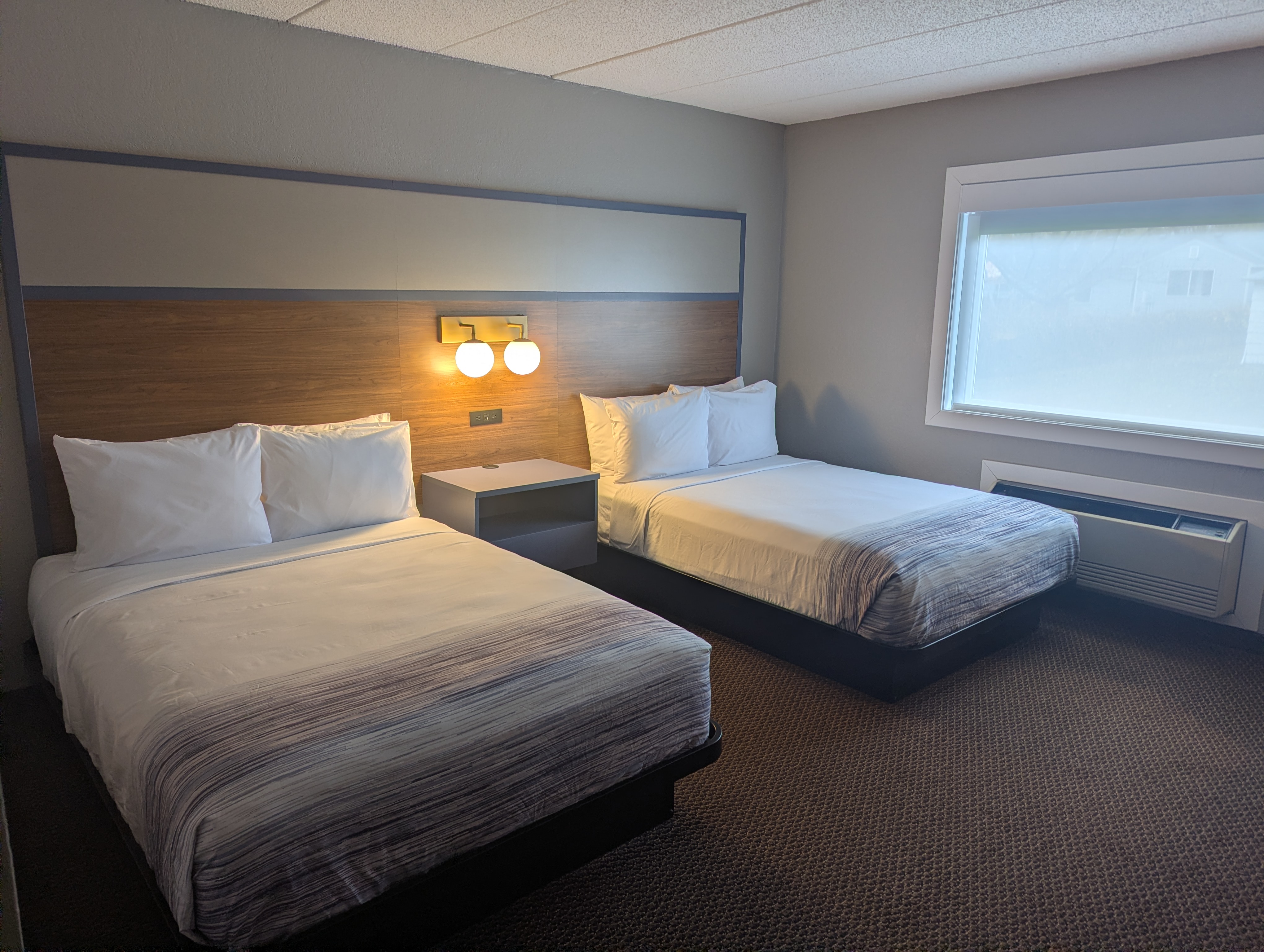 Guest room at the AmericInn by Wyndham St. Peter in Saint Peter, Minnesota