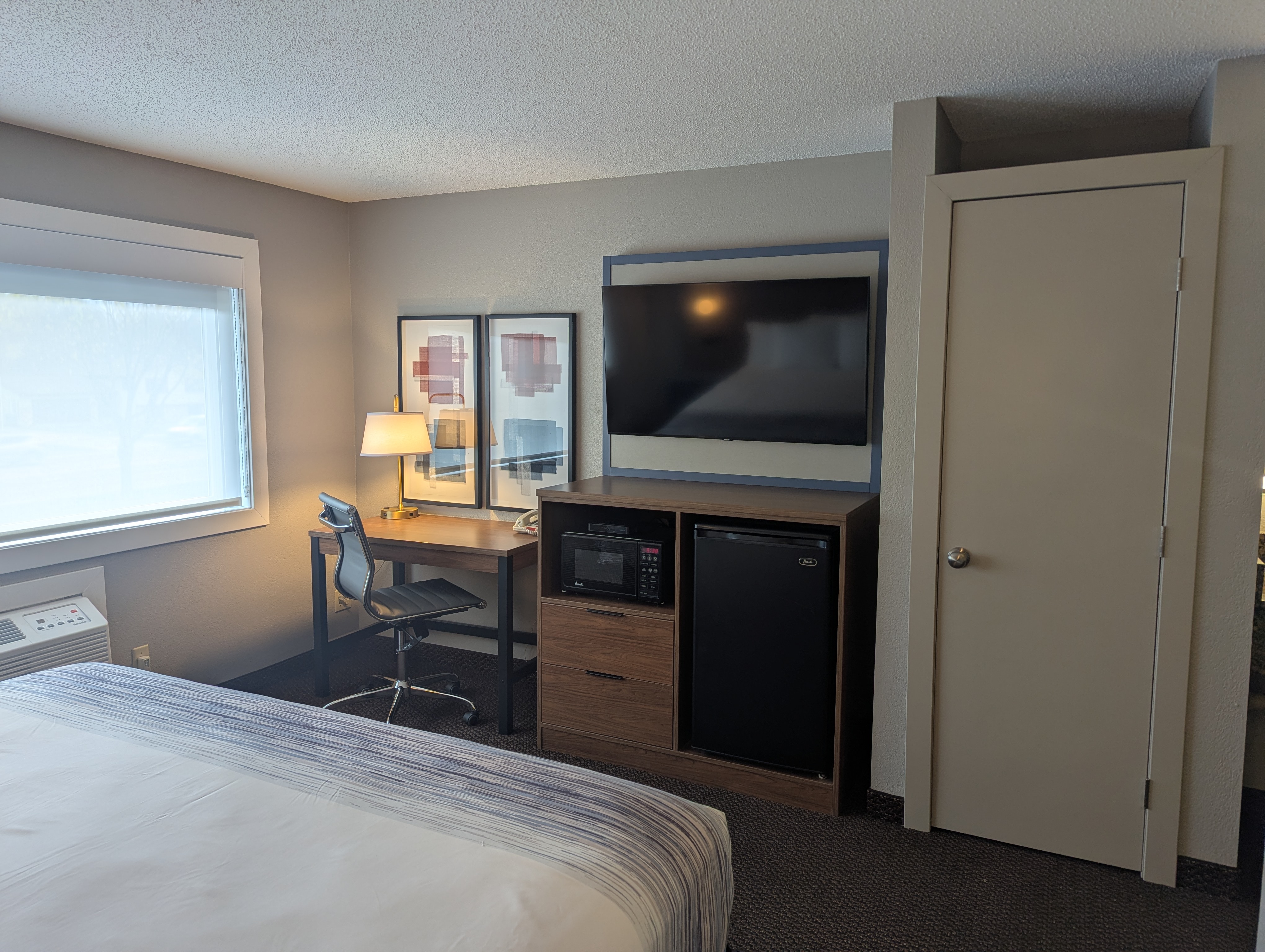 Guest room at the AmericInn by Wyndham St. Peter in Saint Peter, Minnesota