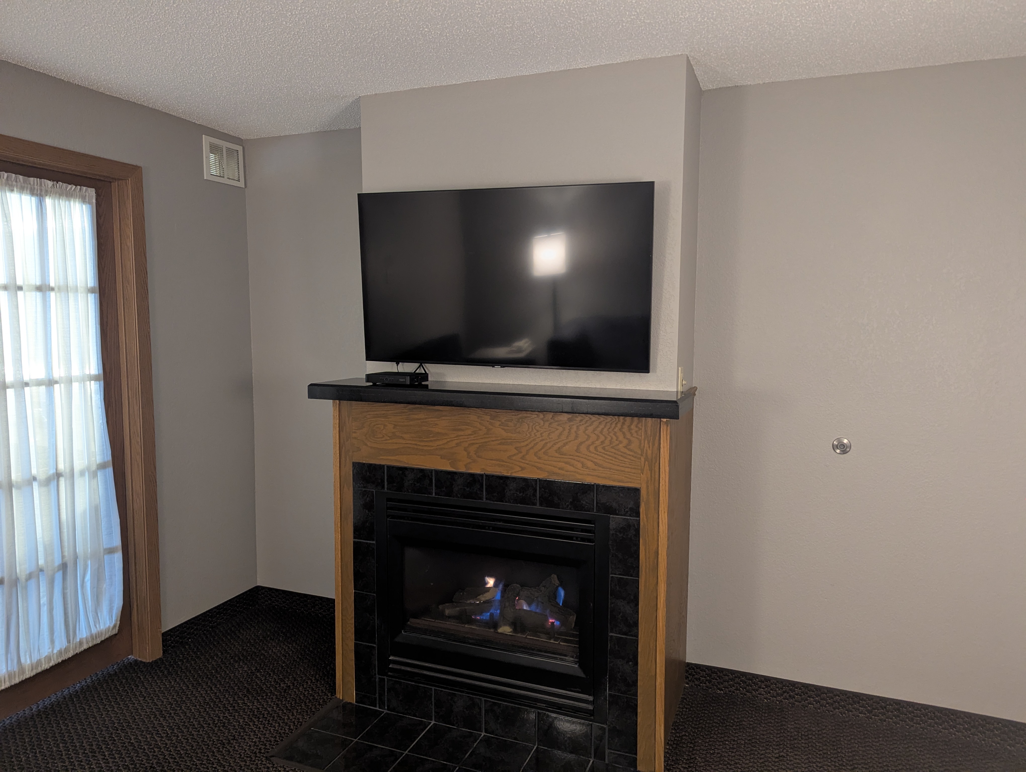 Guest room at the AmericInn by Wyndham St. Peter in Saint Peter, Minnesota