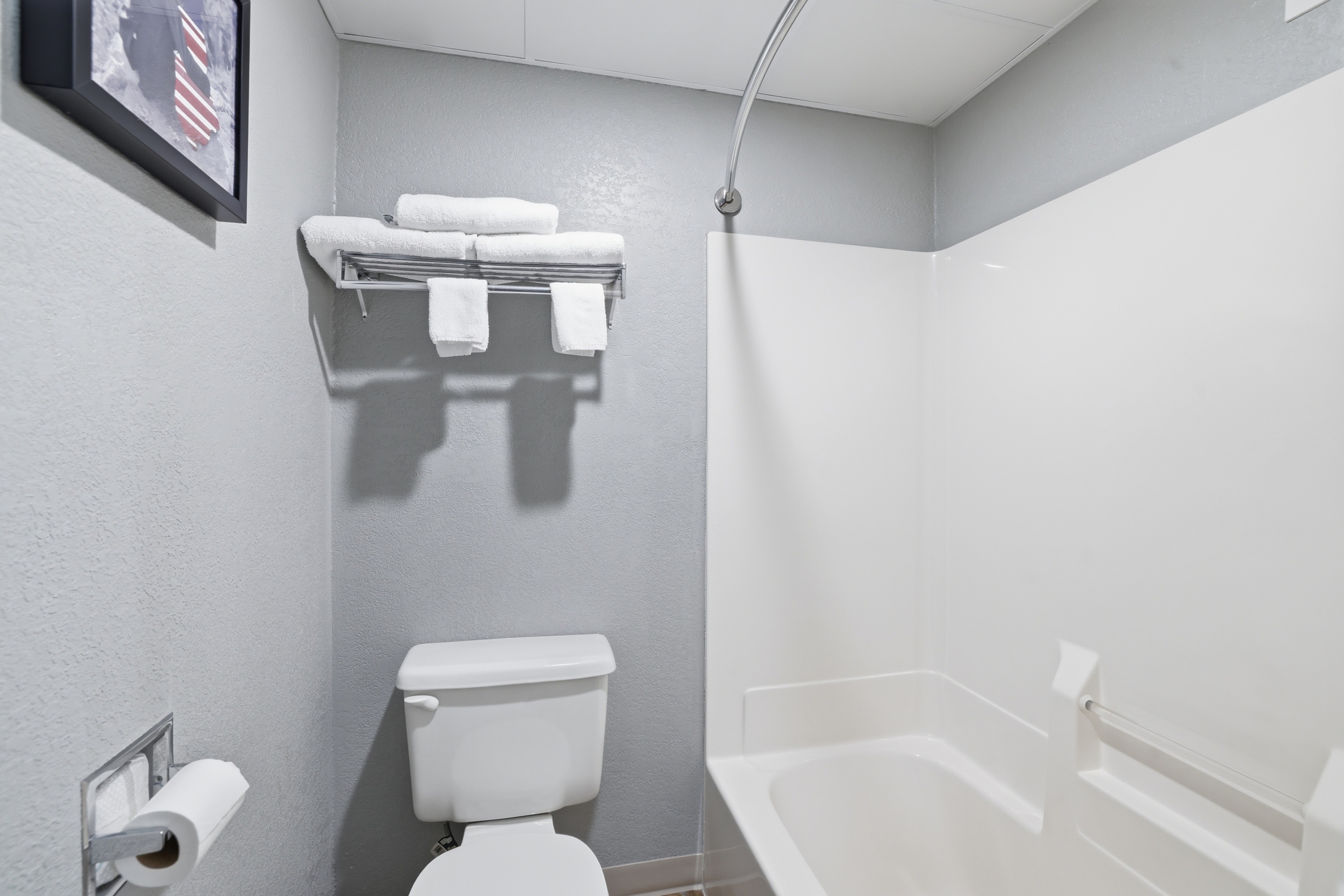 Guest room bath at the AmericInn by Wyndham White Bear Lake St. Paul in White Bear Lake, Minnesota